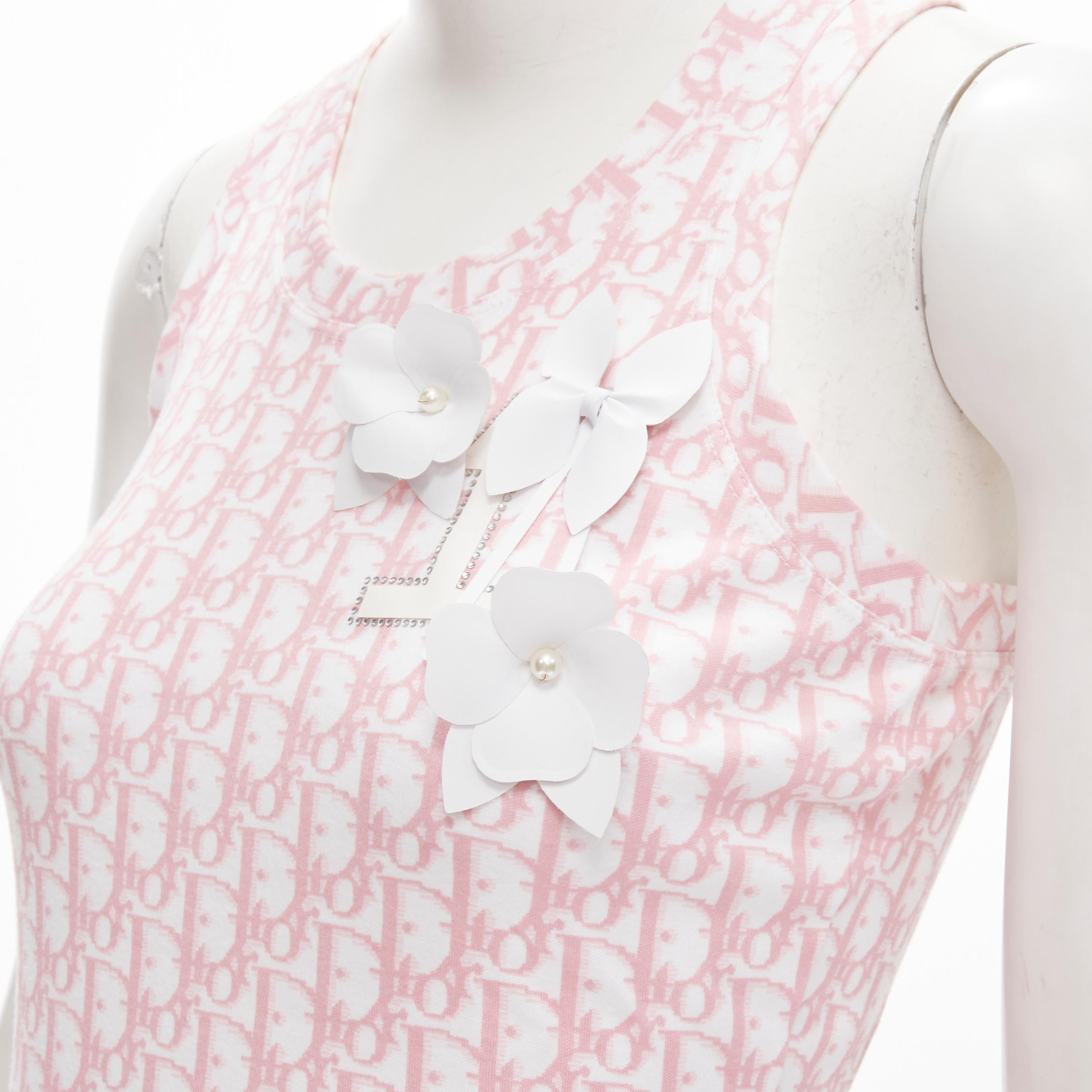 CHRISTIAN DIOR Vintage Y2K pink Trotteur monogram white blossom tank top S 
Reference: ANWU/A00604 
Brand: Christian Dior 
Designer: John Galliano 
Collection: Pink Trotteur 
Material: Feels like cotton 
Color: Pink 
Pattern: Logo 
Extra Detail: