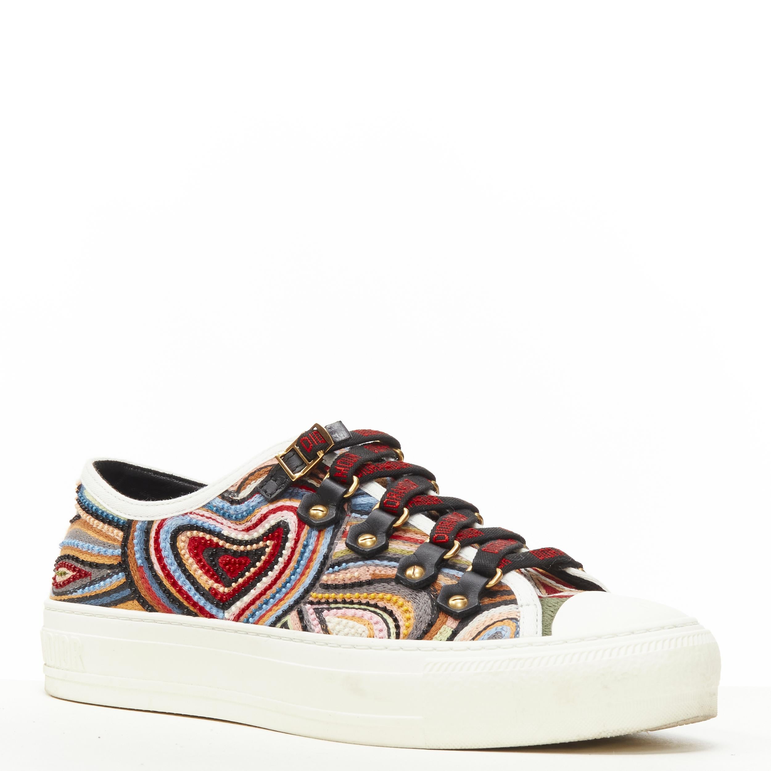 CHRISTIAN DIOR Walk'N'Dior ethnic heart bead embroidery logo lace sneaker EU36 
Reference: ANWU/A00338 
Brand: Christian Dior 
Model: Walk N Dior 
Material: Fabric 
Color: Multi 
Pattern: Ethnic Closure: Lace 
Extra Detail: Beaded embroidery upper.