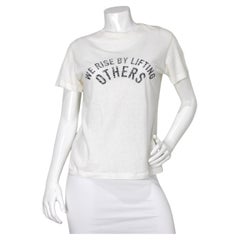Christian Dior "We Rise By Lift Others" T-Shirt ras du cou