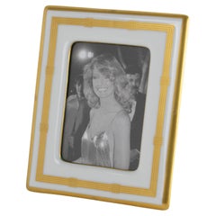 Marco de cerámica blanca y dorada Christian Dior, hacia 1980