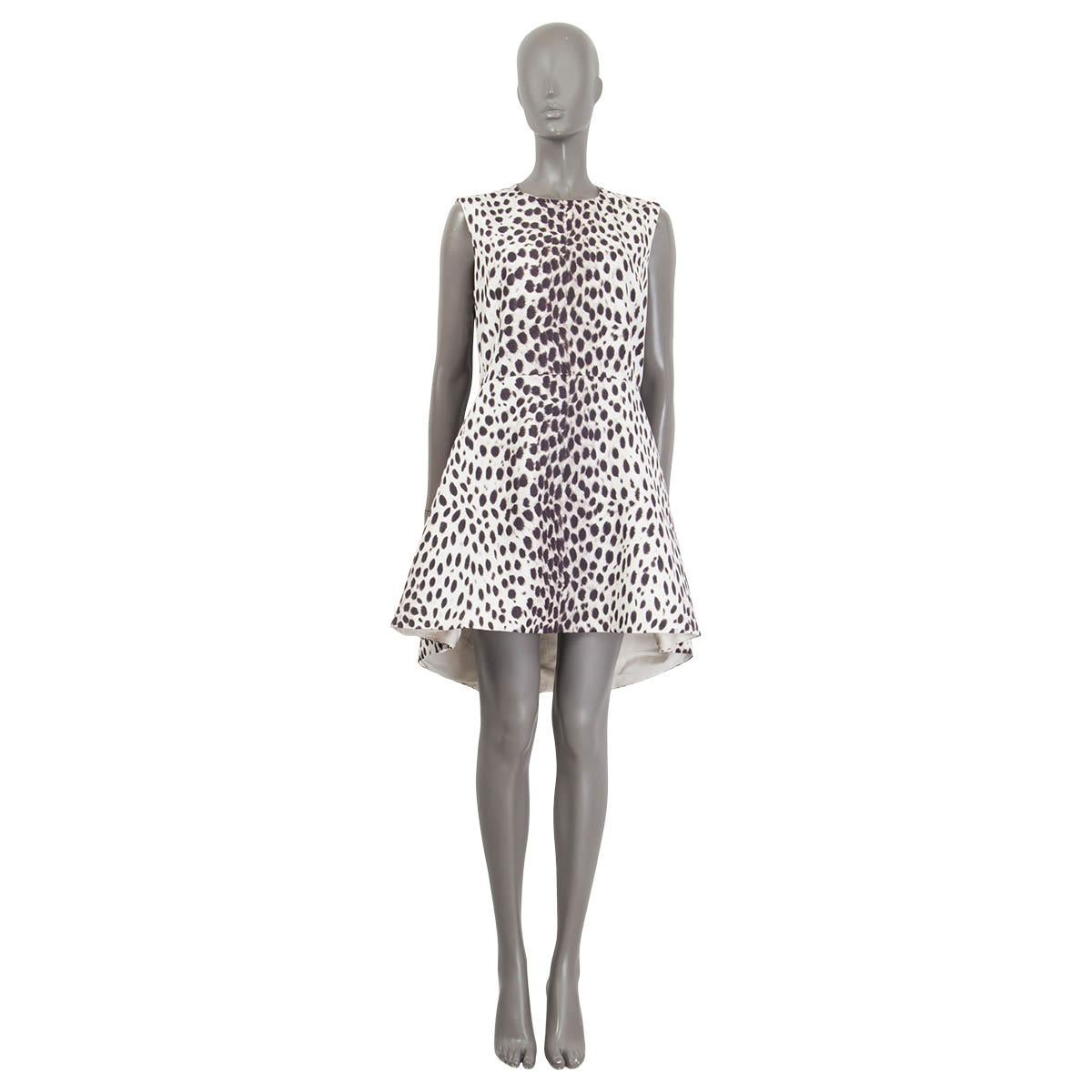 100% authentic Christian Dior cheetah print a-line dress in off-white, black and gray cotton and viscose (assumed as content tag is no longer legible). Features two slit pockets at the sides and an asymmetric fit. Opens with a concealed zipper and a