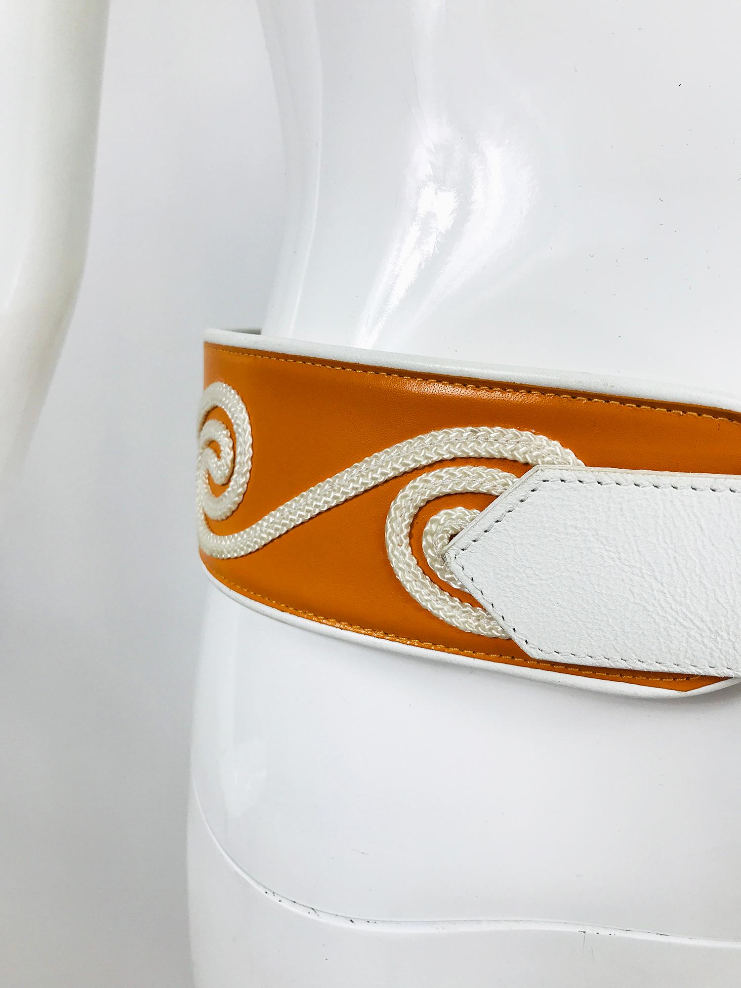 Christian Dior white & golden yellow cord applique wide leather belt marked medium-large. From the 1990s a beautiful wide leather belt in white leather with golden yellow, the center of the belt is appliqued with white cord. The belt is trimmed in