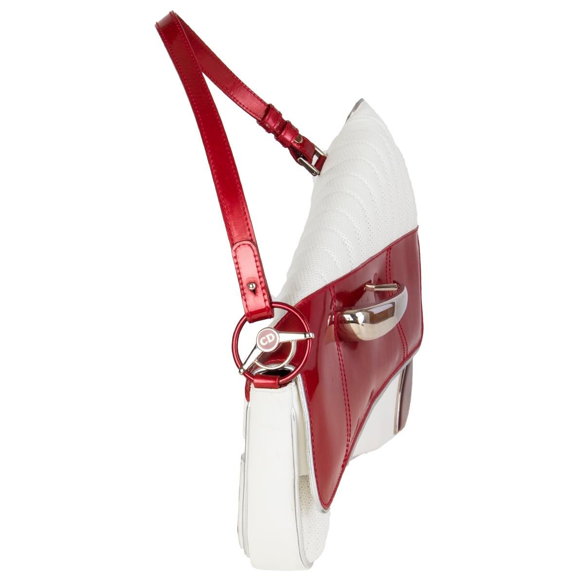 Christian Dior Vintage 'Cadillac' saddle bag in quilted white calfskin and a strawberry red patent leather featuring silver leather trim. Cadillac door handle flap and license plate on the back side. Extra zip pocket under the flap. Opens with a