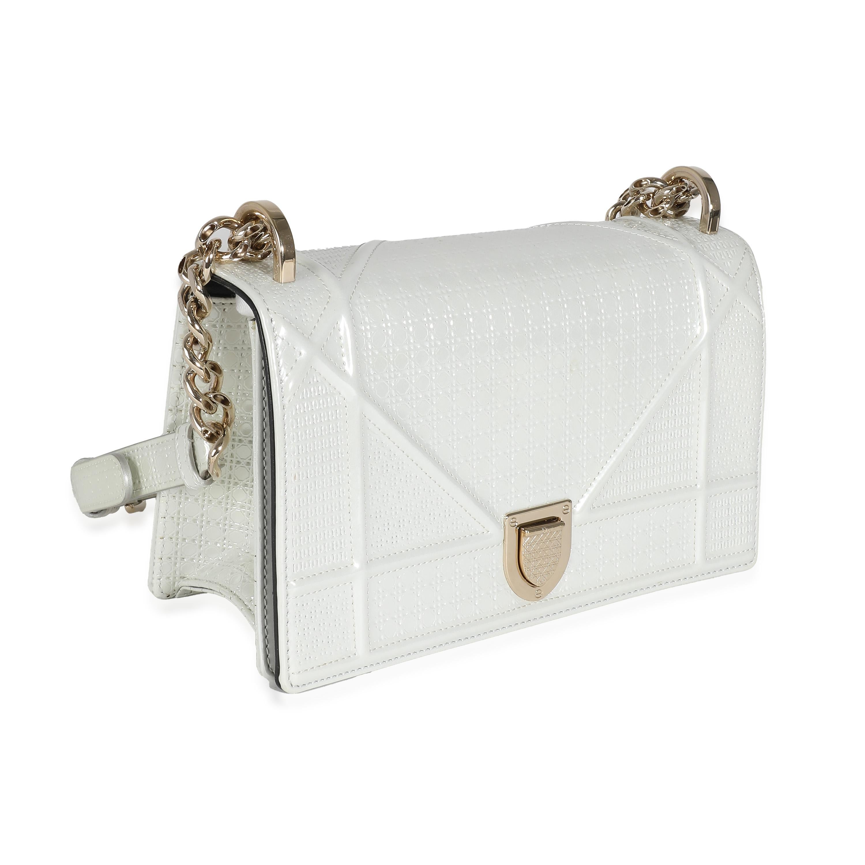 Listing Title: Christian Dior White Micro Cannage Patent Small Diorama Flap Bag
SKU: 137840
MSRP: 3100.00 USD
Condition: Pre-owned 
Handbag Condition: Very Good
Condition Comments: Item is in very good condition with minor signs of wear.  Scratching
