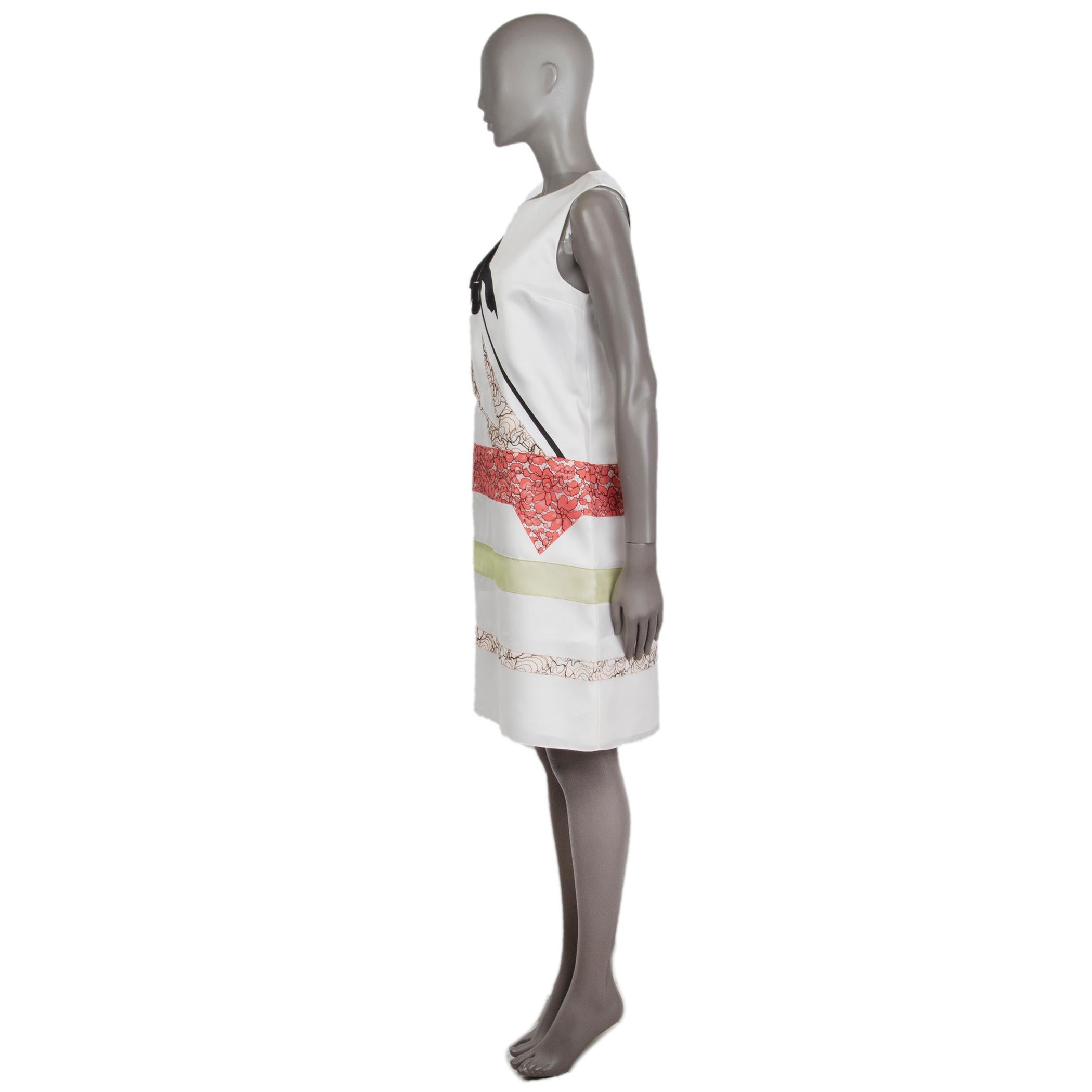 Christian Dior lace-panelled shift dress in off-white, black, coral, rose, and sage silk (100%). Closes with hook and invisible zipper on the back. Lined in off-white silk (100%). Has been worn and is in excellent condition. 

Tag Size 38
Size