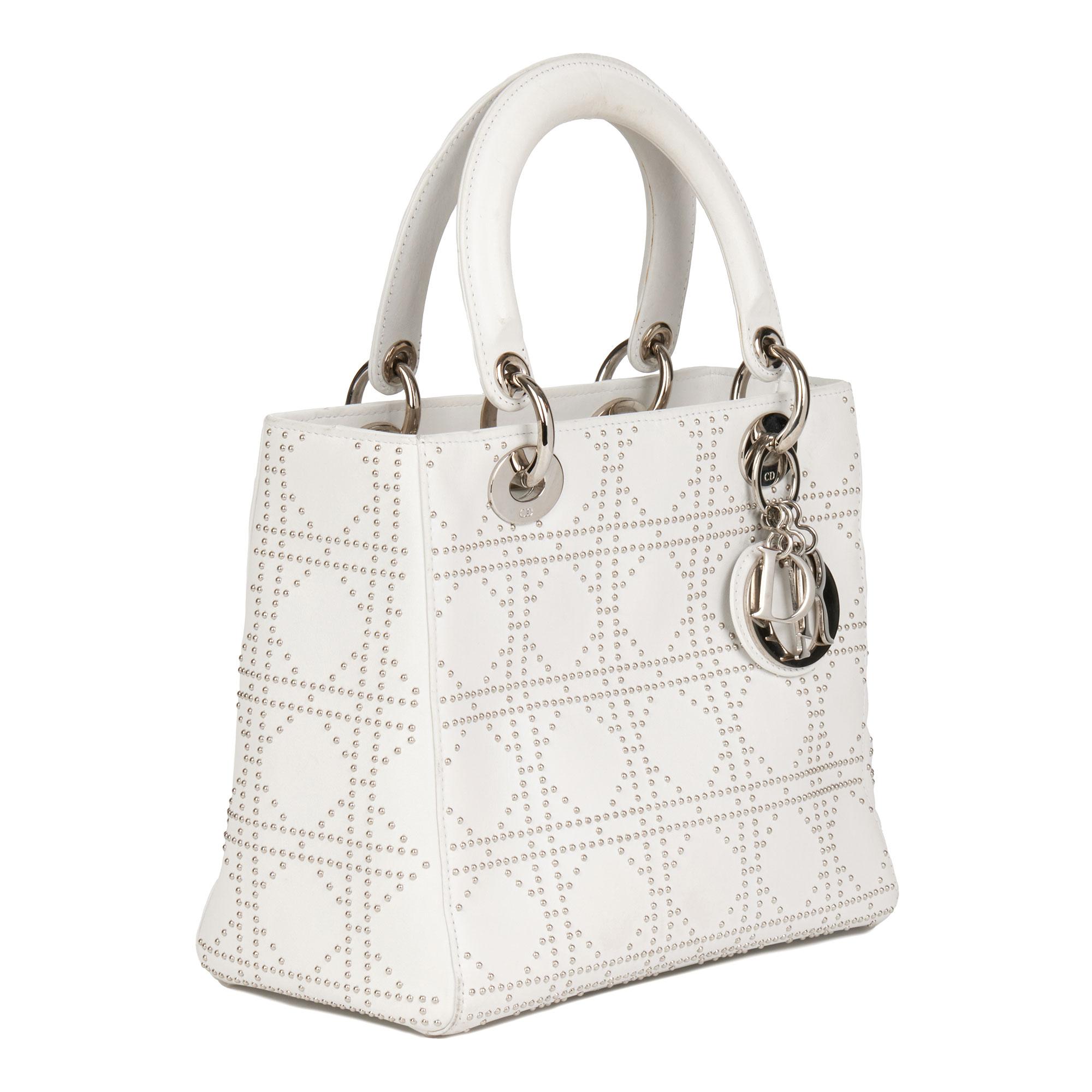CHRISTIAN DIOR
White Studded Calfskin Leather Medium Lady Dior

Serial Number: 09-MA-1013
Age (Circa): 2003
Accompanied By: Christian Dior Dust Bag
Authenticity Details: Date Stamp (Made in Italy)
Gender: Ladies
Type: Tote, Shoulder

Colour: