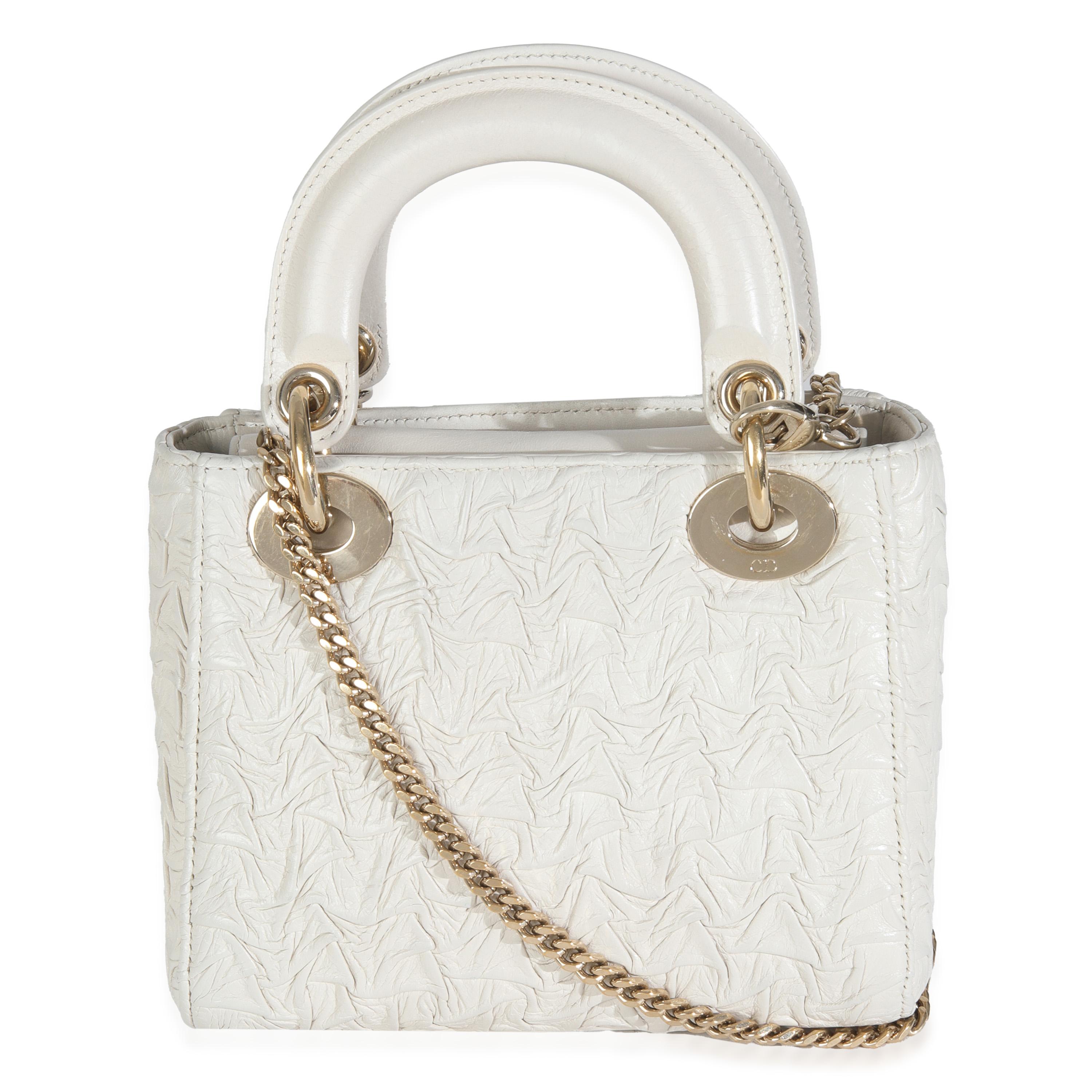 Título del listado: Christian Dior Blanco Piel de becerro texturizada Mini Lady Dior
SKU: 146502
Estado: Seminuevo 
Descripción del estado: Originalmente llamado 