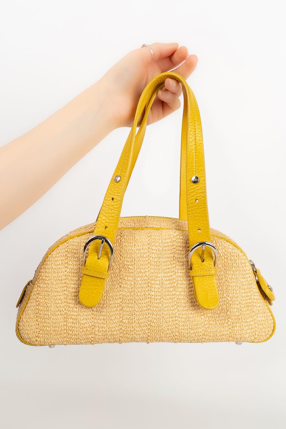 Dior -Bag in raffia and yellow leather decorated with flowers and rhinestones. Limited edition 