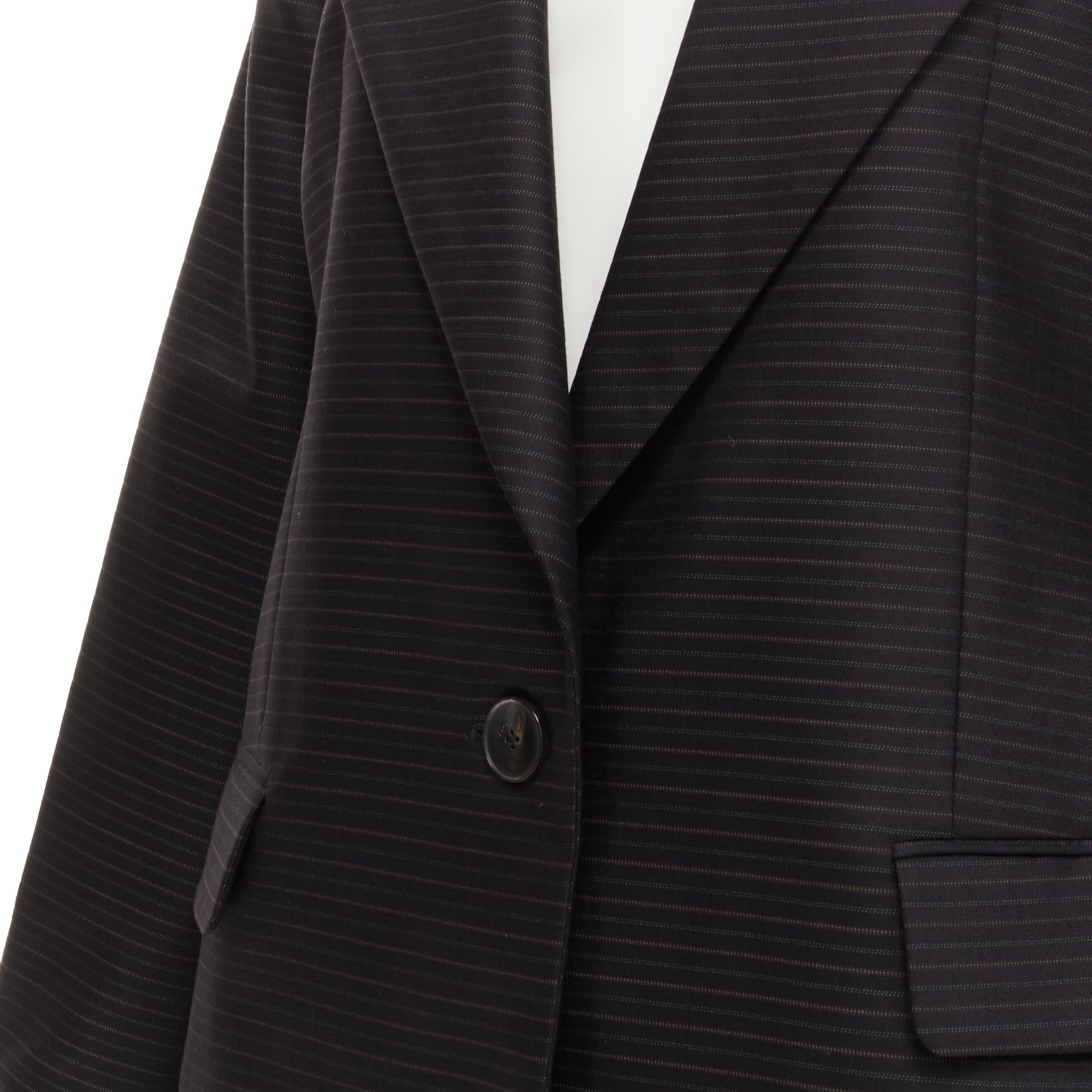 CHRISTIAN DIOR wool silk black brown horizontal pinstripe blazer jacket FR42 L 
Reference: GIYG/A00164 
Brand: Christian Dior 
Material: Wool 
Color: Black 
Pattern: Pinstripe 
Closure: Button 
Extra Detail: Wide notched spread collar. Single button