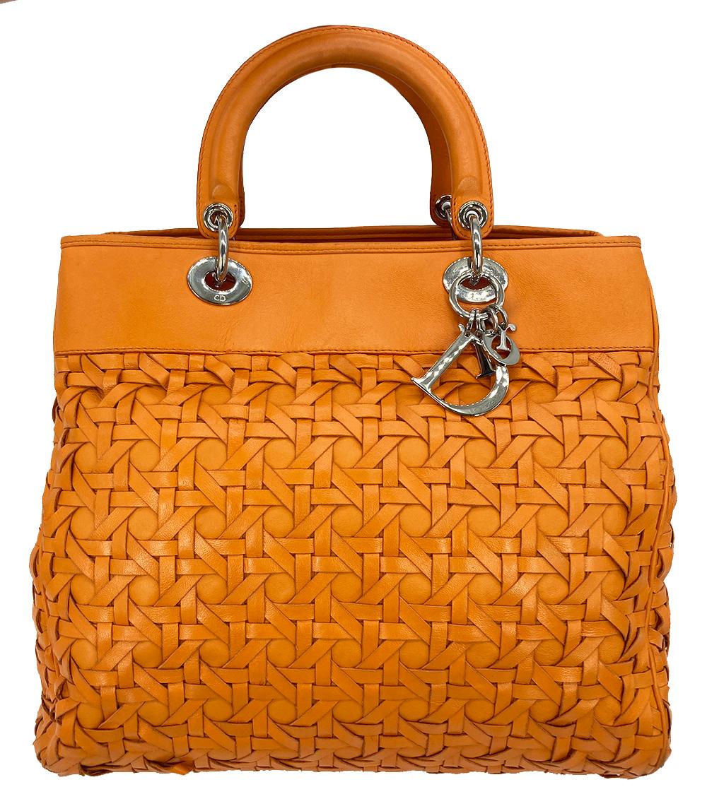 Christian Dior Woven Leather Orange Lady Dior Avenue Tote in excellent condition. Orange woven lambskin leather trimmed with silver hardware and matching removable leather shoulder strap. Double top handles. No closure. Two separate interior