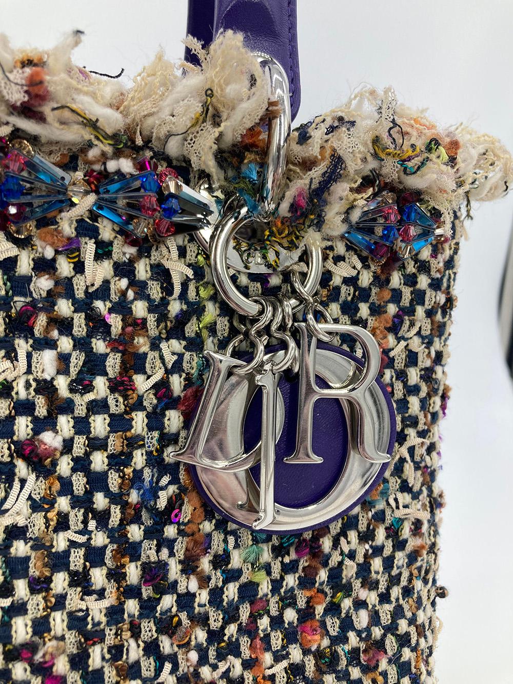 Christian Dior Woven Tweed Crystal Medium Lady Dior Bag in New without tag condition. Woven multi color tweed with purple leather trim and swarovski crystal details along top edge. Silver hardware. Top zipper closure opens to purple leather interior