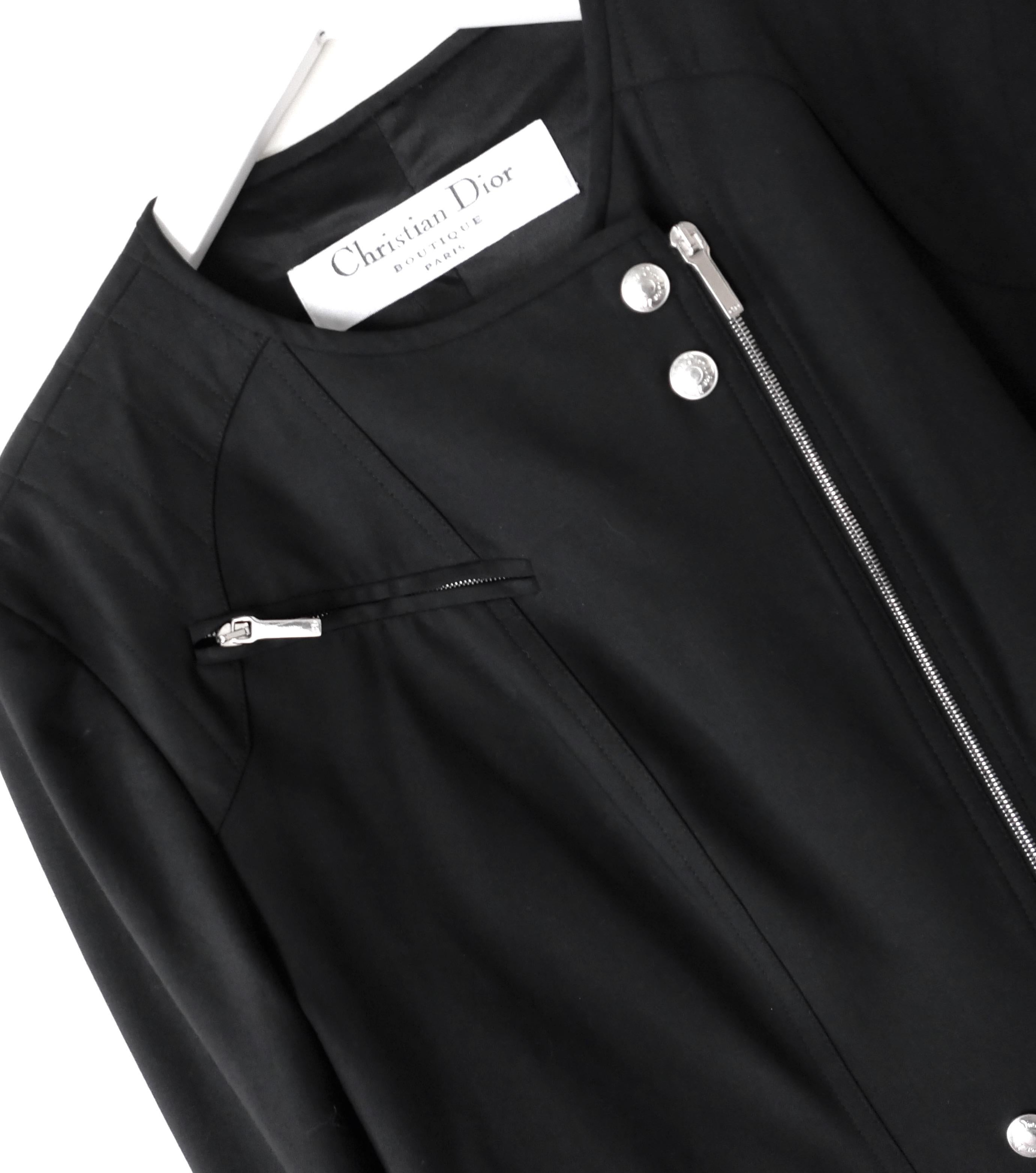Absolutely incredible vintage Christian Dior jacket from John Galliano's Spring 2004 collection. Unworn. Made from soft, lightweight viscose and wool mix with embossed silvertone DIOR poppers and fobs throughout. It has a slim, tailored biker jacket