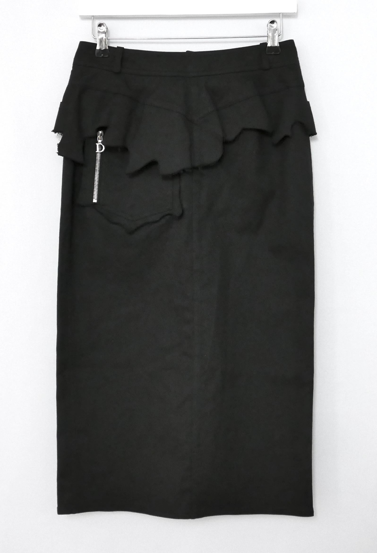 Absolutely amazing, super collectible skirt from John Galliano's Spring 2001 collection for Dior. Unworn. 

Made from black cotton denim with 2% elastane, it has the most fabulous triple layered ripped frill peplum waist. This is fully removable