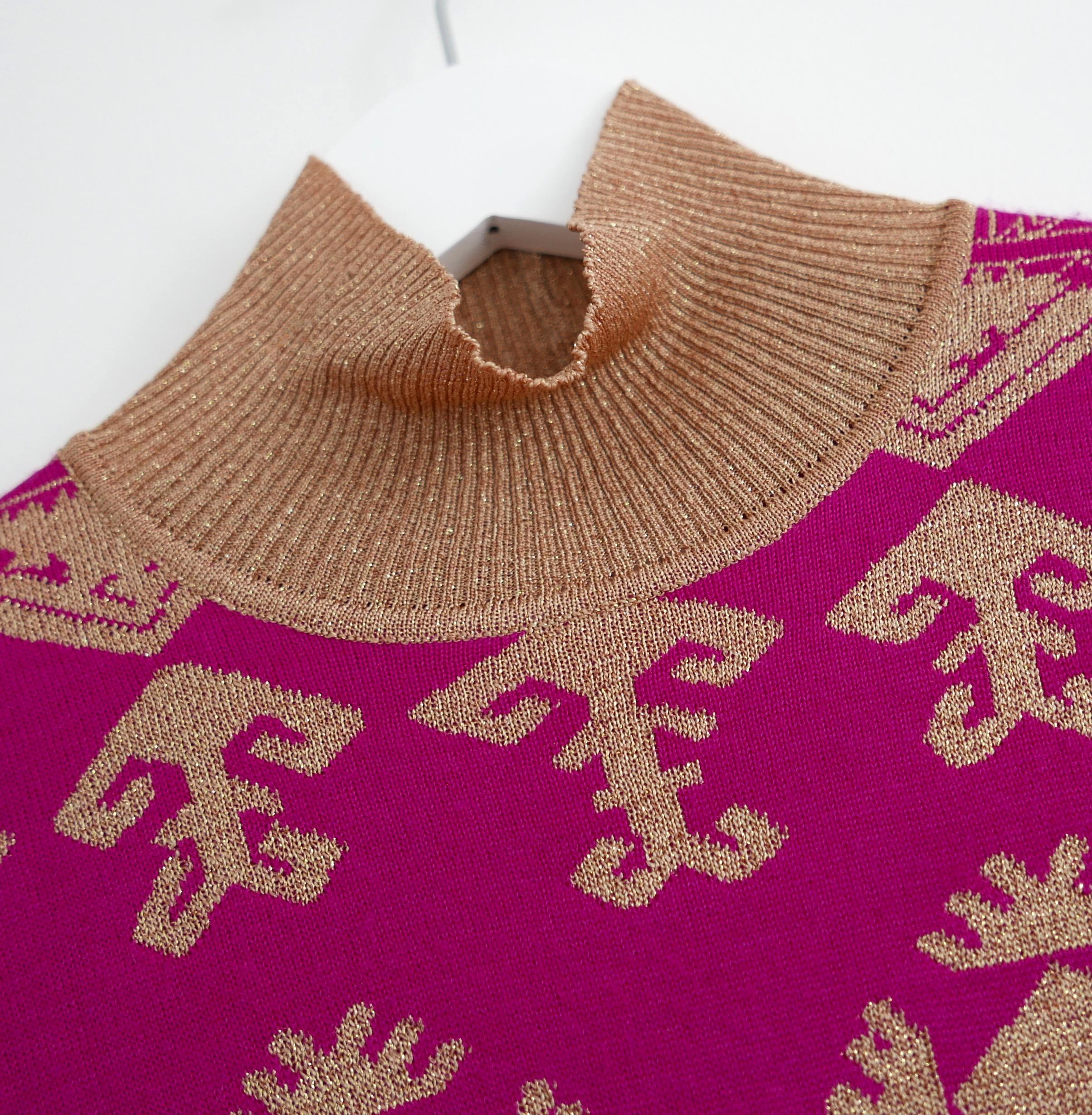 Stunning Christian Dior vintage sweater from John Galliano's Fall 2002 Collection. In excellent vintage condition and has been newly dry cleaned 

Made from ultra soft sunset inspired ombre acetate and wool mix knit with sparkling gold lurex Indian