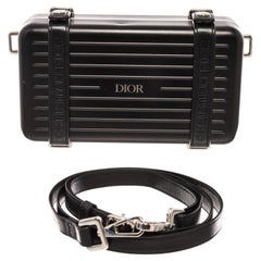 Christian Dior X Rimowa Personal Clutch aus schwarzem Aluminium und Kalbsleder