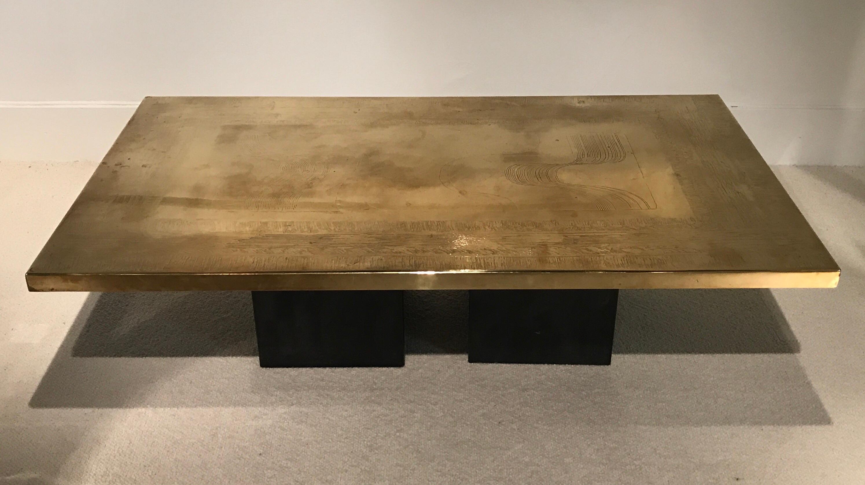 1970s Christian Heckscher etched brass coffee table;
Signed by the artist on the top
Black iron feet in original condition.
