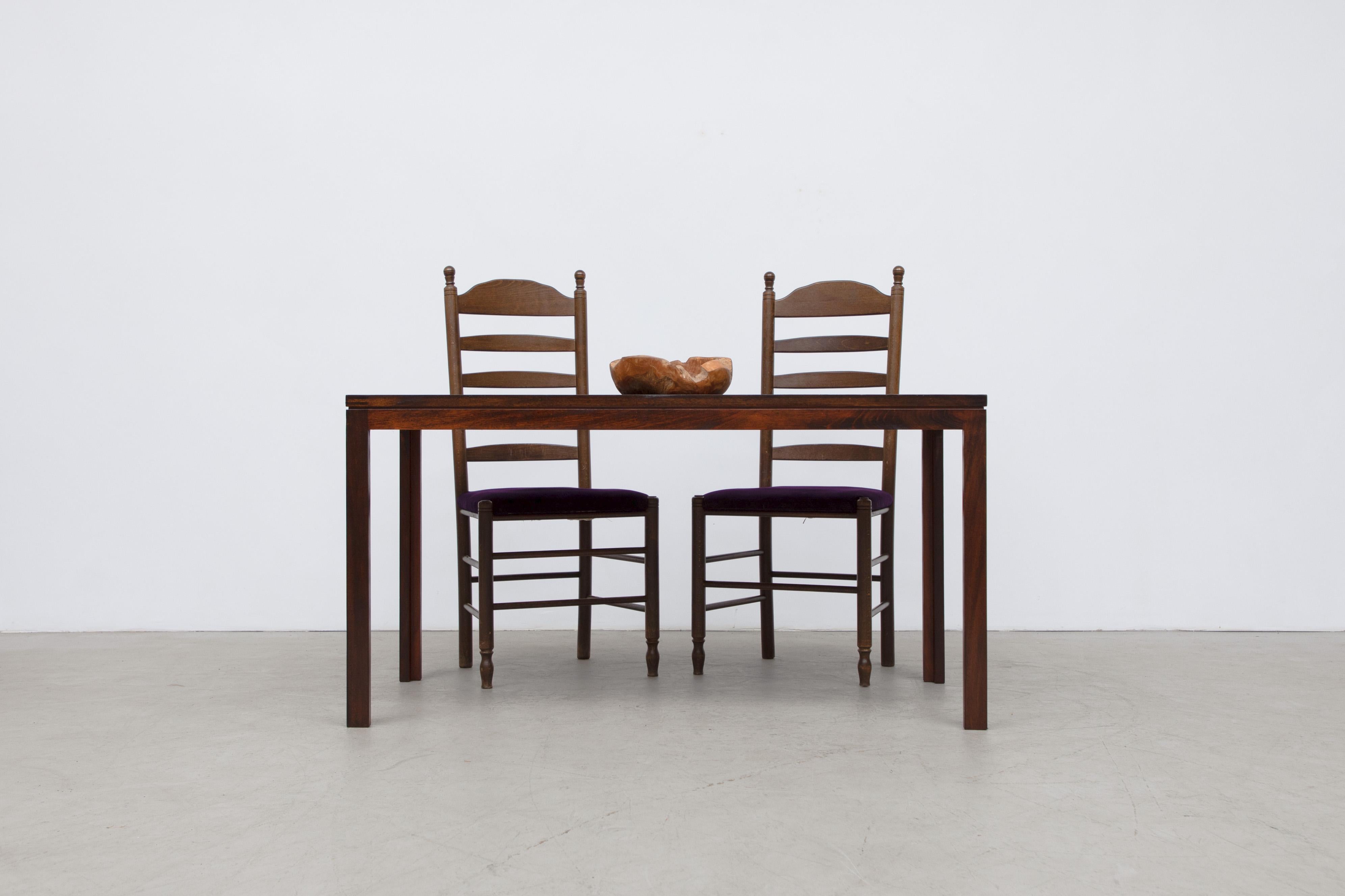 Christian Hvidt mid-century cherry dining table for Soborg Mobler. Lightly refinished in good overall condition with some wear and scratching consistent with age and use. Two available. Shot with Quaker style ladder back dining chairs