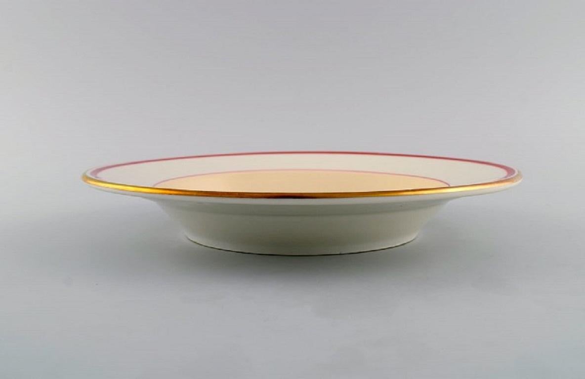 Porcelaine Christian Joachim pour Royal Copenhagen, « Le motif espagnol », quatre assiettes profondes en vente