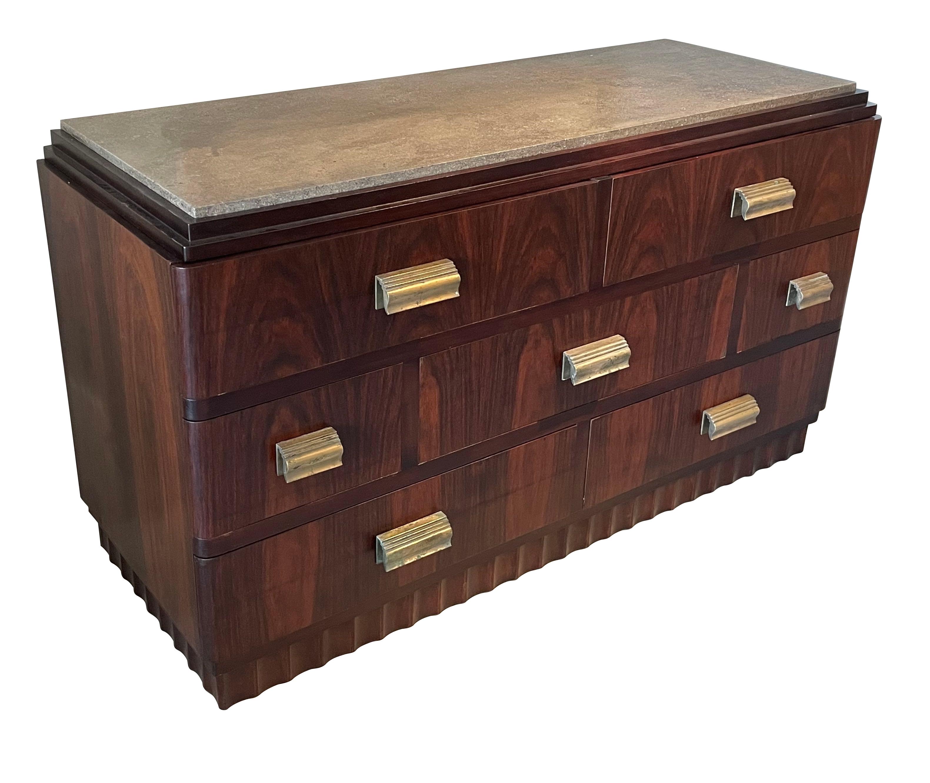 1930's French commode designed by Christian Krass.
Marble top.
Seven drawers with original cast bronze hardware.
Polished walnut with decorative grain. 
Wavy designed base.
ARRIVING AUGUST.
