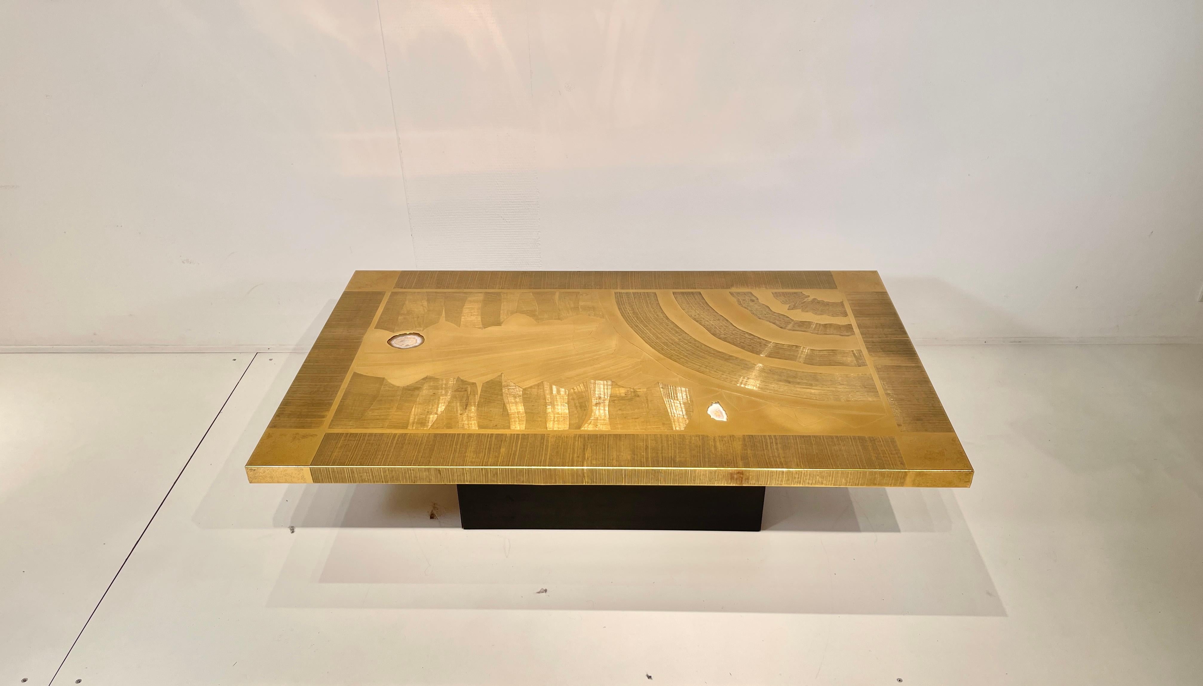 Engraved etched brass coffee table designed by Christian Krekels in 1977s, with 2 agates stone top. This furniture has a New refresh, new varnish and polish.
Signed, dated and numbered by the Artist.