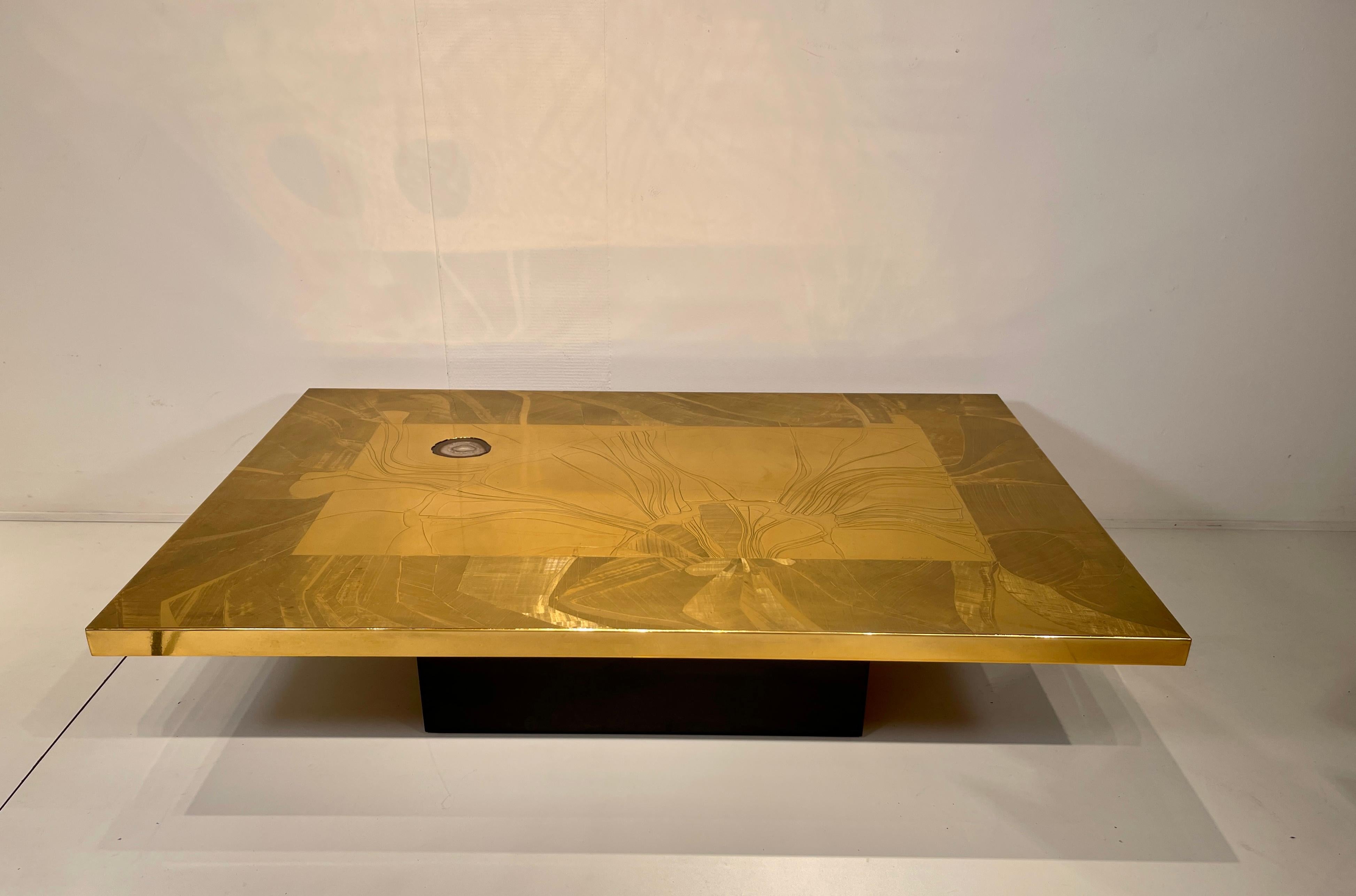 Engraved etched brass coffee table designed by Christian Krekels in 1970s, with malachite stone top. This furniture has a New refresh, new varnish and polish.
Signed by the Artist.