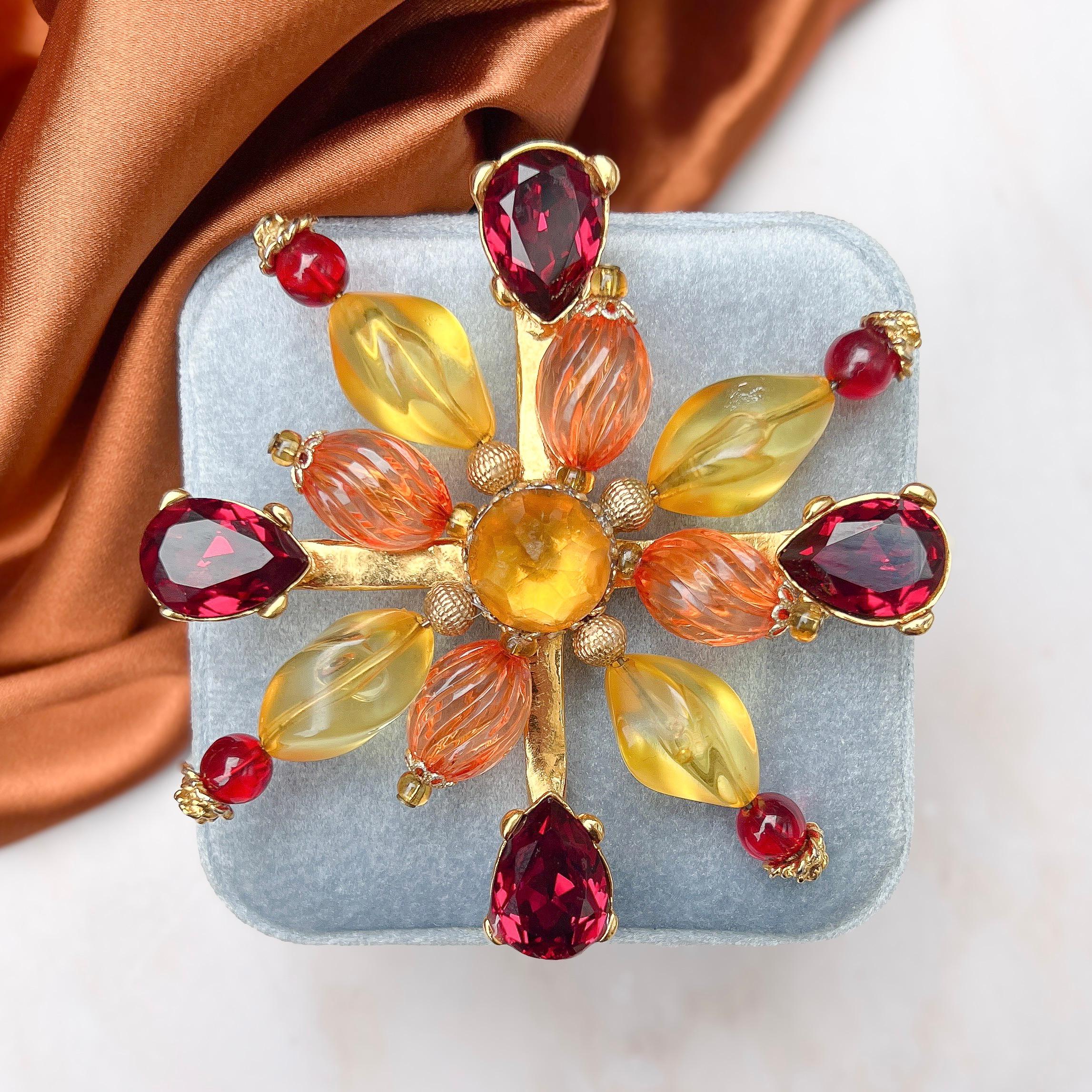 This joyful and bright brooch by French designer Christian Lacroix was made in the 1990s. 

Condition Report:
Excellent

The Details...
This brooch is constructed from gold plated metal. It features a bold flower design and is detailed with round