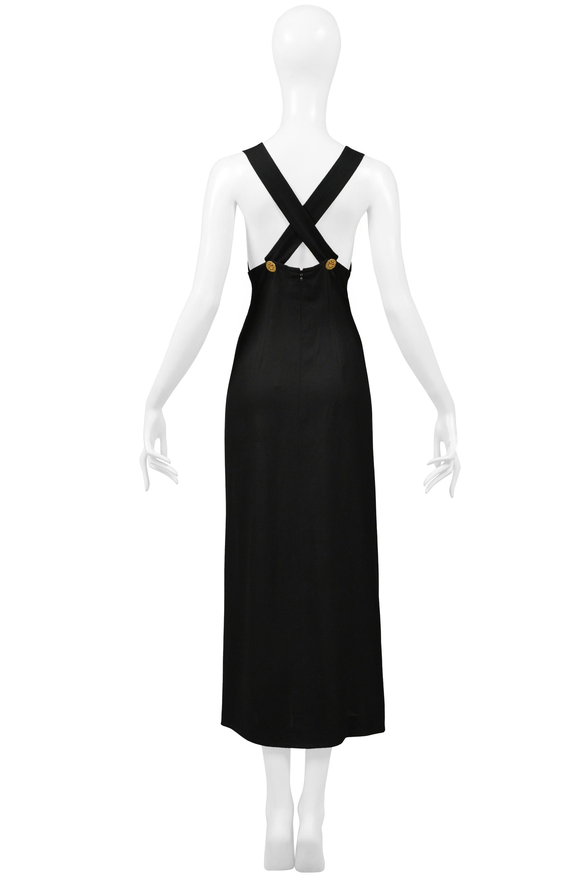 Resurrection Vintage is excited to offer a vintage Christian Lacroix black Hollywood dress featuring gold textured rods at front, a sweetheart neckline, criss-cross straps at back, detailed gold buttons at backcrosses, 3/4 length, a dramatic slit on