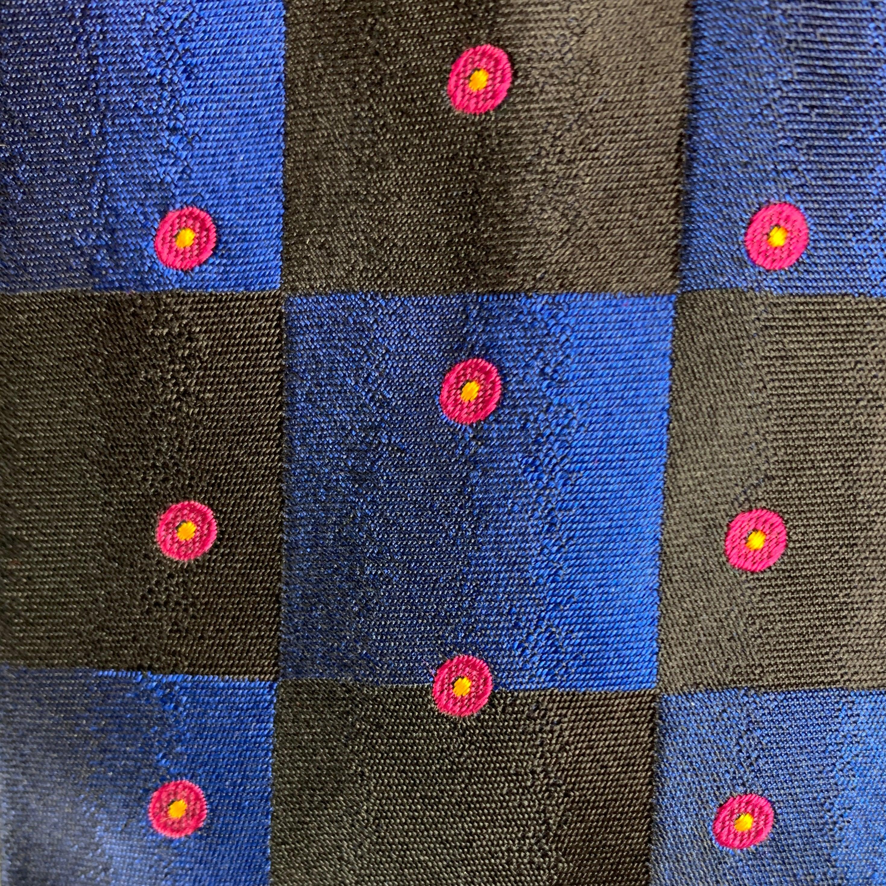CHRISTIAN LACROIX classic necktie comes in a black and navy checkered print, featuring pink dots. 100% silk. Made in Italy.
Very Good Pre-Owned Condition.
 

Measurements: 
  Width: 3.5 inches Length: 58 inches 




  
  
 
Reference: