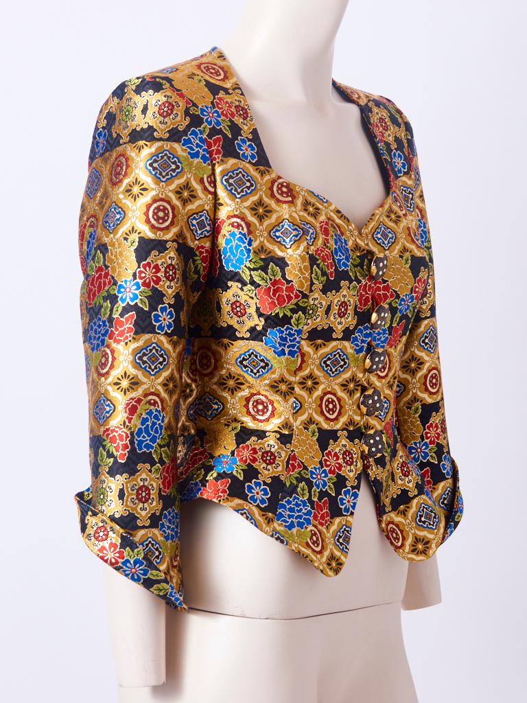 Christian Lacroix, multitone, floral brocade, on a gold ground, fitted jacket, having a peplum, 3/4 cuffed sleeve, open, sweetheart neckline and jeweled buttons.