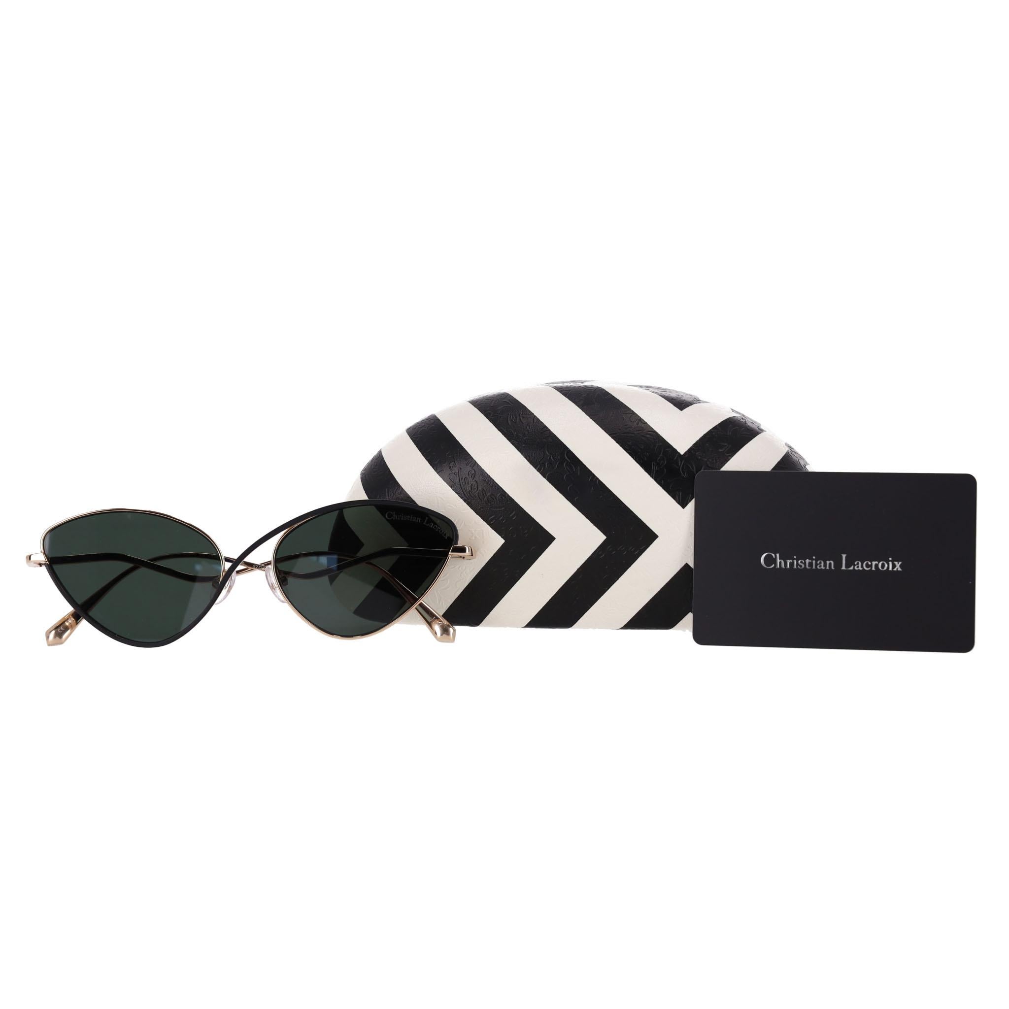 Christian Lacroix Cat-Eye Sunglasses

Dark green/grey lenses with fancy asymmetric designed bridge and curved gold arms.

Featuring 'Christian Lacroix' signature to the lens and print to the arm.

Rrp Approx. £300

Size – One Size

Condition – Very