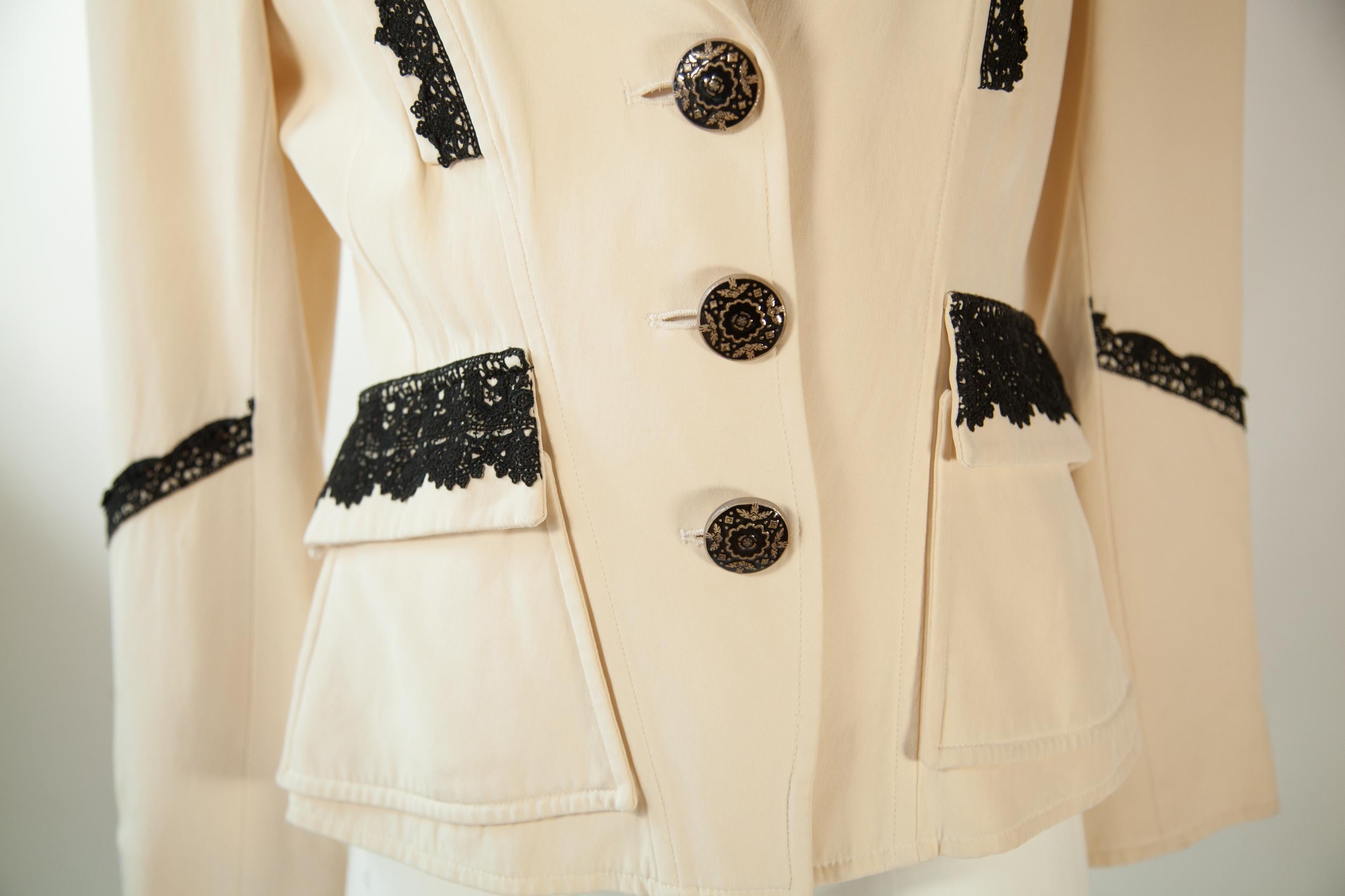 Beige Christian Lacroix, cream, three-button blazer, lace detail and trapezoid pockets