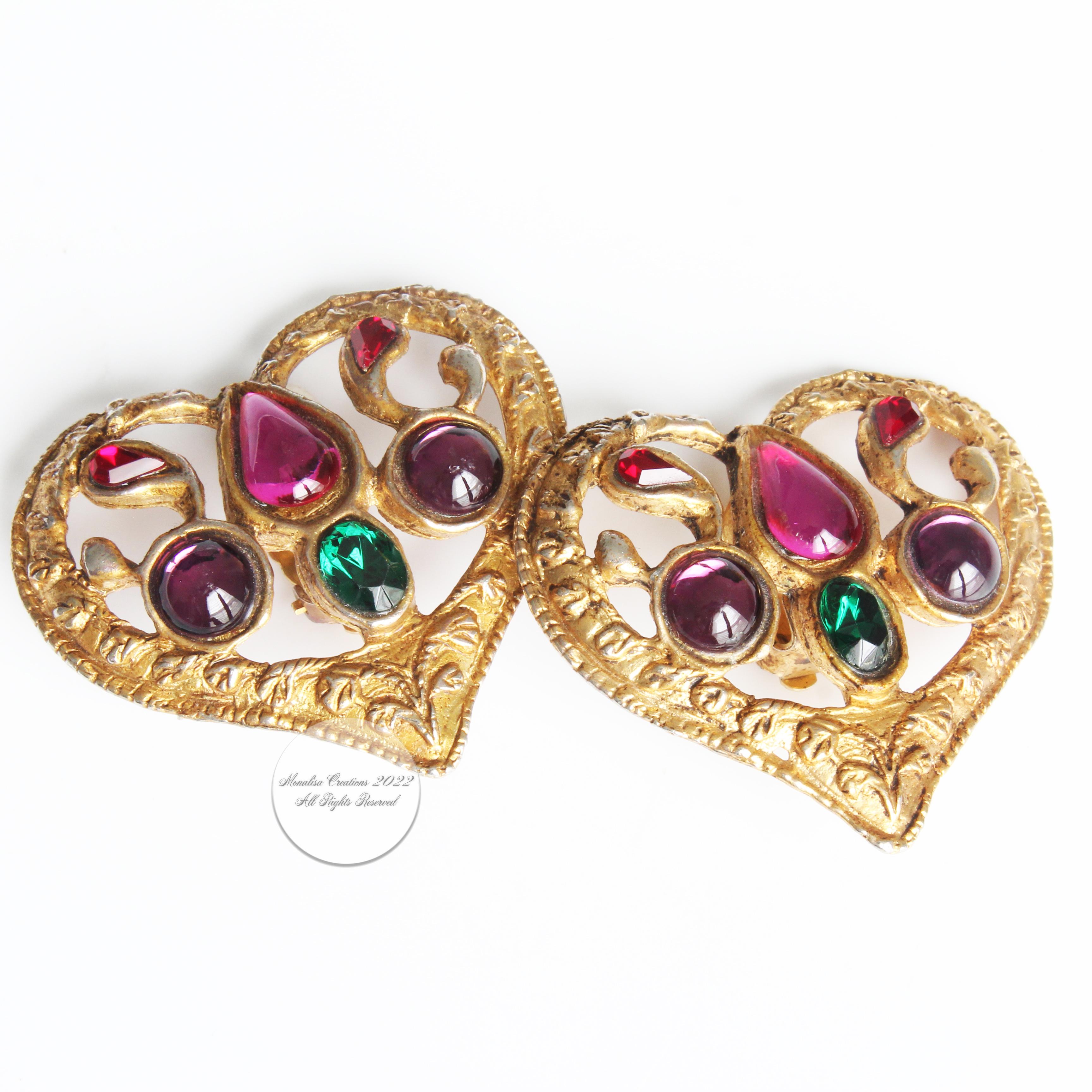 Preowned vintage and rare Christian Lacroix oversized heart-shaped earrings with colorful cabochons, likely made in the 90s.  Gorgeous statement earrings that are certain to generate compliments! Each earring measures approximately 2in L x 1.85in H.