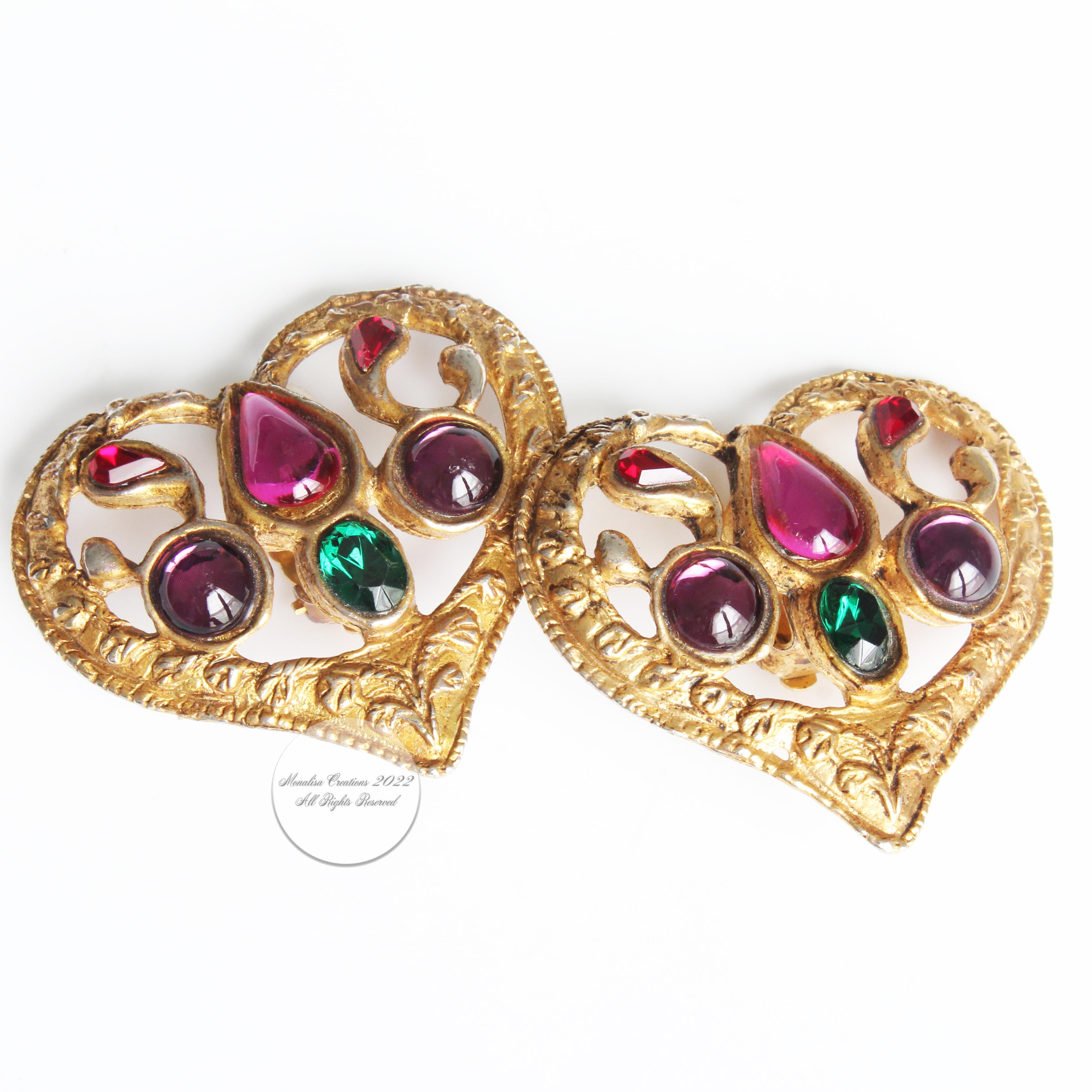 Preowned vintage and rare Christian Lacroix oversized heart-shaped earrings with colorful cabochons, likely made in the 90s.  Gorgeous statement earrings that are certain to generate compliments! Each earring measures approximately 2in L x 1.85in H.