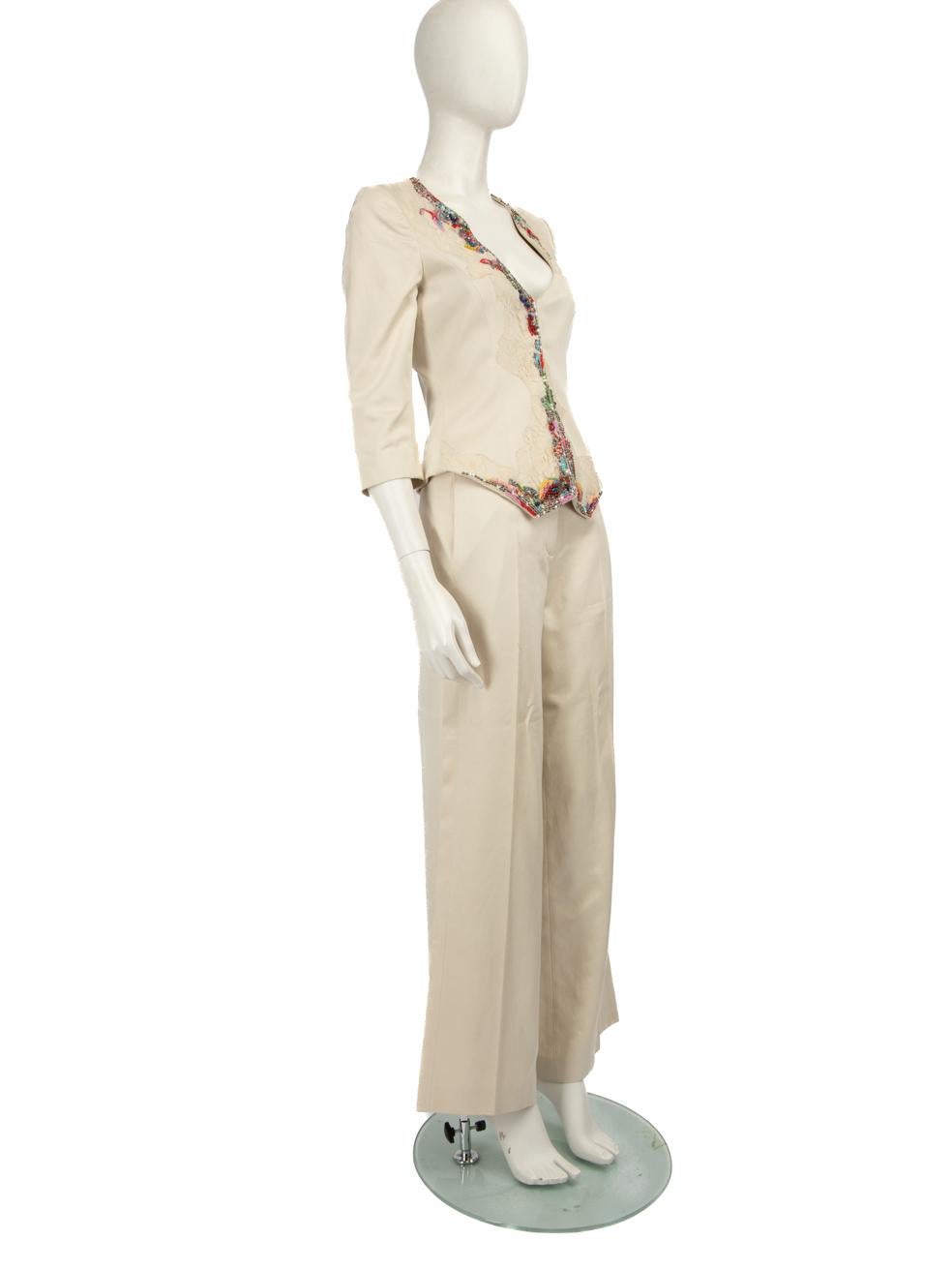 CONDITION is Good. Minor wear to the blazer is evident, there is discolouration in the lining around the underarms. There are marks on the shoulders, the front the left sleeve, the front and back of both legs on the trousers and around the leg cuffs
