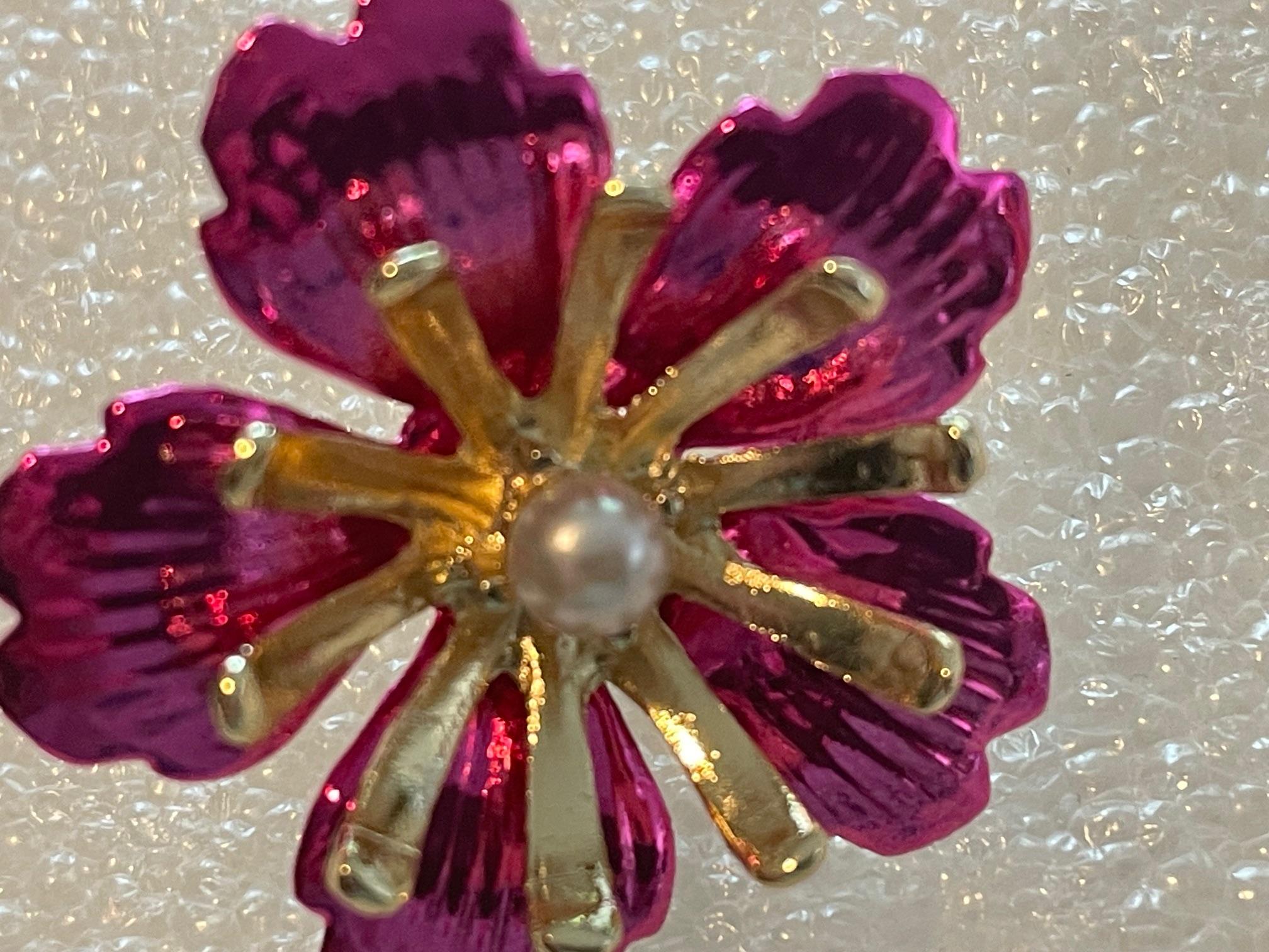 Christian Lacroix flower earrings, famous designer from the 80s, magnificent fuchsia earrings with a pearl in the centre.