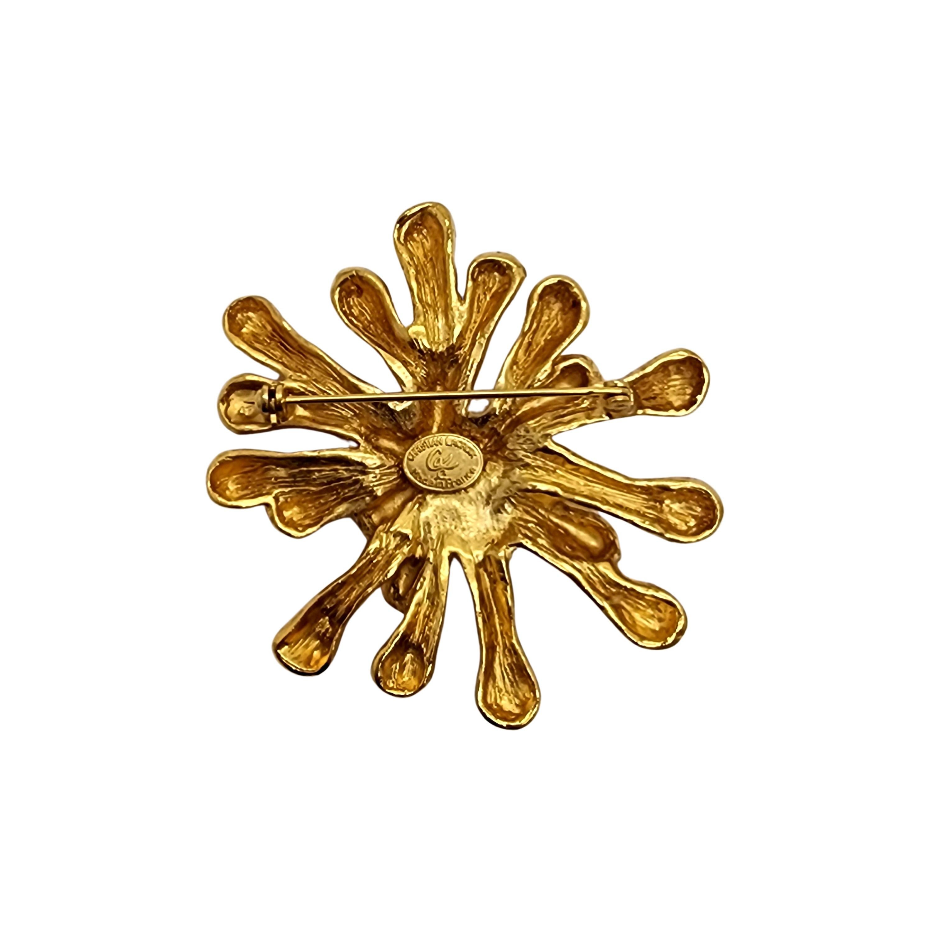 Vintage gold tone splash splatter pin/brooch by Christian LaCroix, France.

Beautiful piece by iconic French designer, Christian LaCroix, known for his extravagant designs. Features a splash splatter or amoeba design.

Measures approx 2 5/8