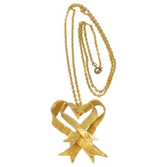 Christian Lacroix Gilt Metal Bowtie Pendant Necklace