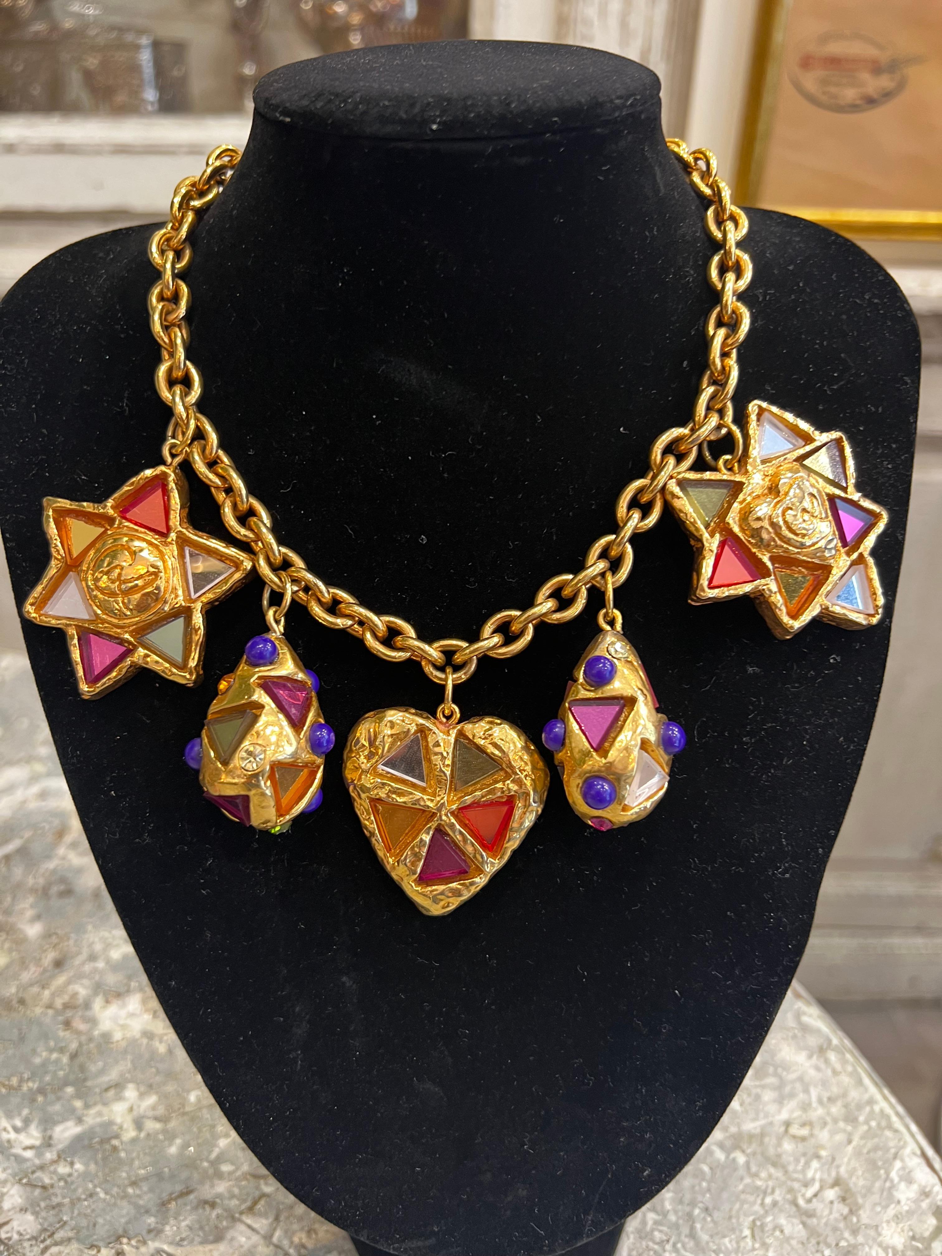 Christian Lacroix Paris Vintage Statement Necklace 90s Rainbow Heart & Stars Design, High-Quality Jewelry Glass, Gold-Plated Elements

This Christian Lacroix Paris Vintage Necklace from the 1990s is a stunning statement piece that combines bold
