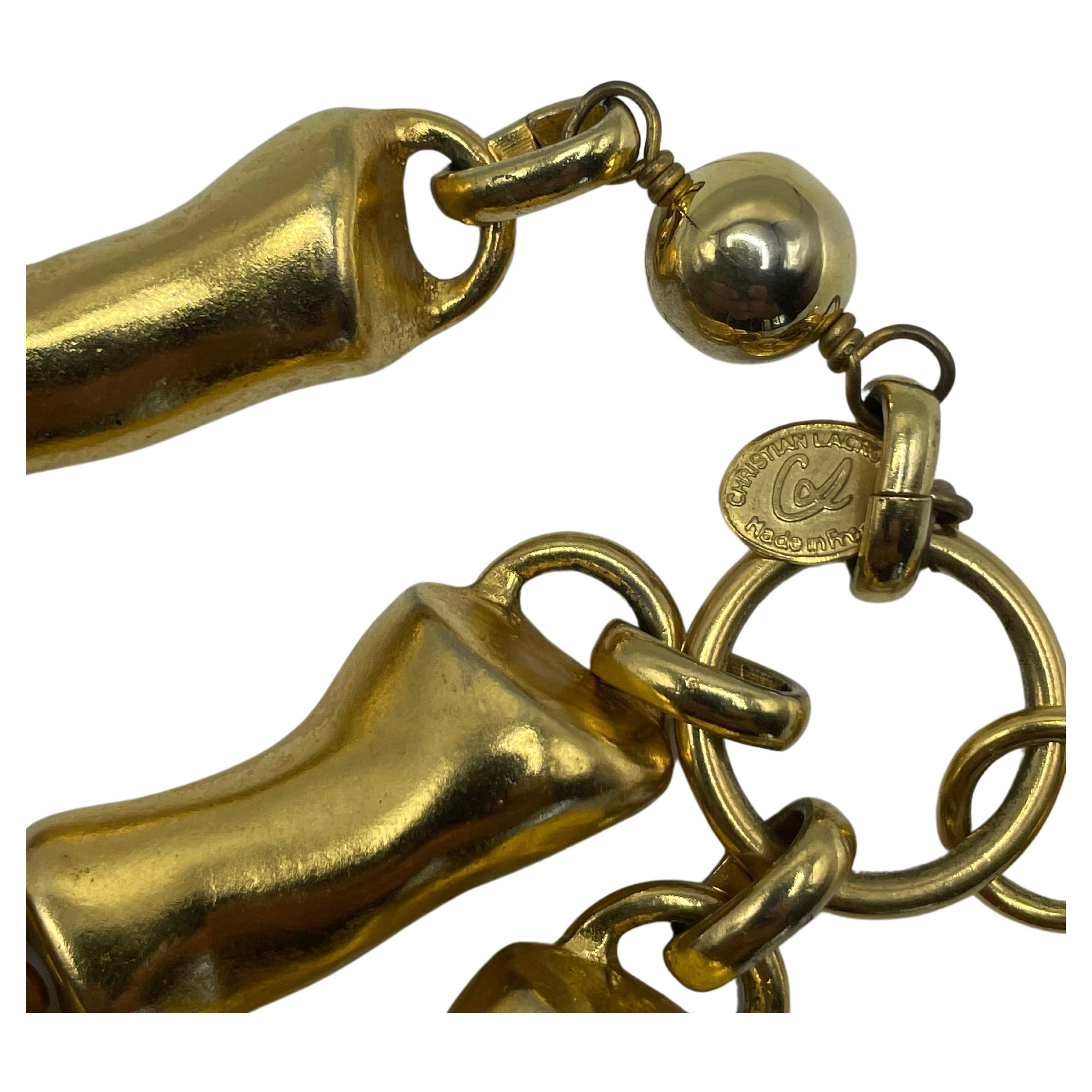 Korallengold-Bernstein-Halskette von Christian Lacroix. An einer einzigen Kette befinden sich drei unterschiedlich große Halsketten.
Vergoldet.
In tadellosem Zustand und ausgezeichneter Qualität. 
Stempel von Christian Lacroix. 
Hergestellt in