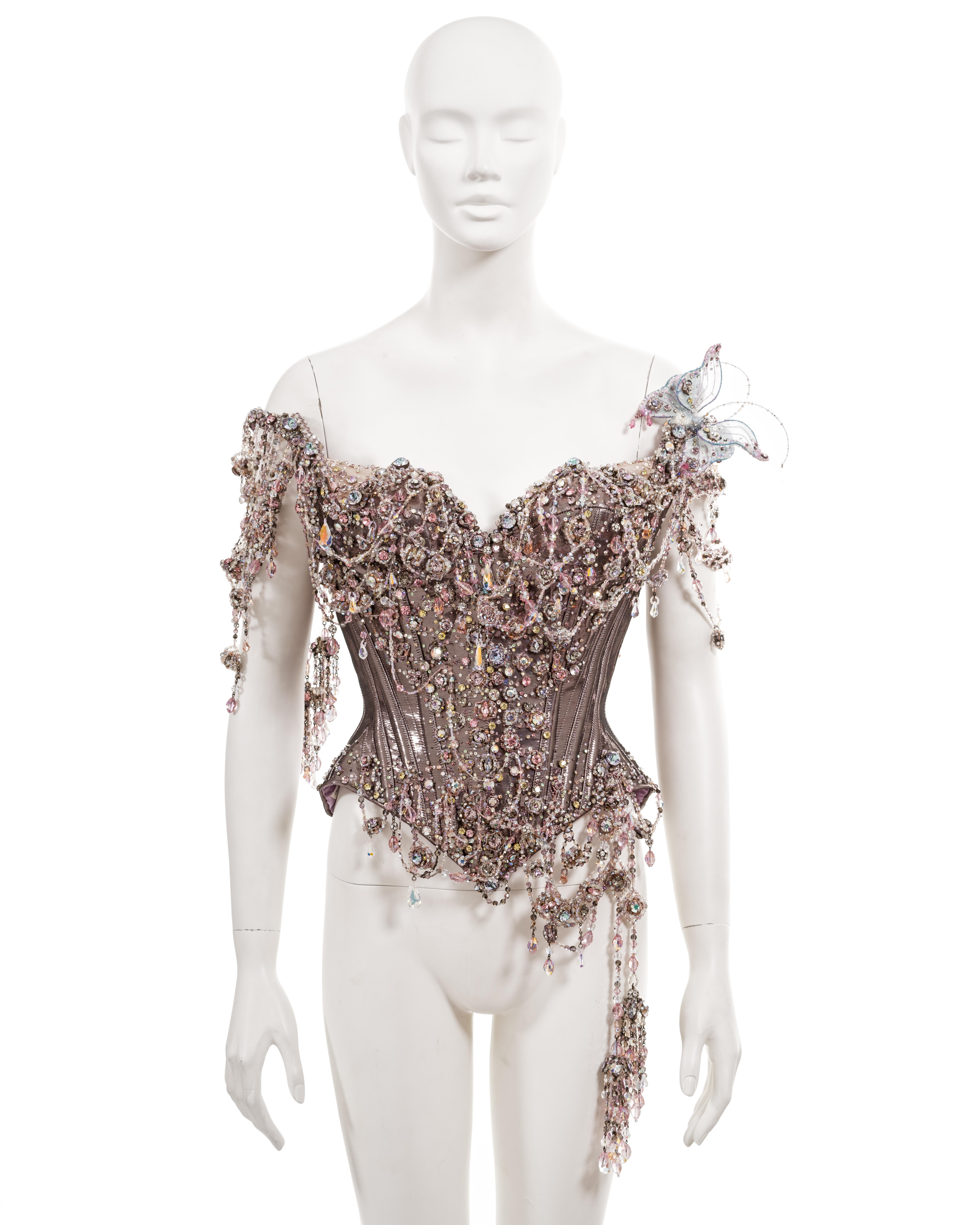 ▪ Archival Christian Lacroix Mr. Pearl Corset 
▪ Haute Couture, Spring-Summer 1996, Look #53
▪ Sold by One of a Kind Archive
▪ Museum Grade 

Introducing the Archival Christian Lacroix Corset, a remarkable piece of fashion history hailing from the
