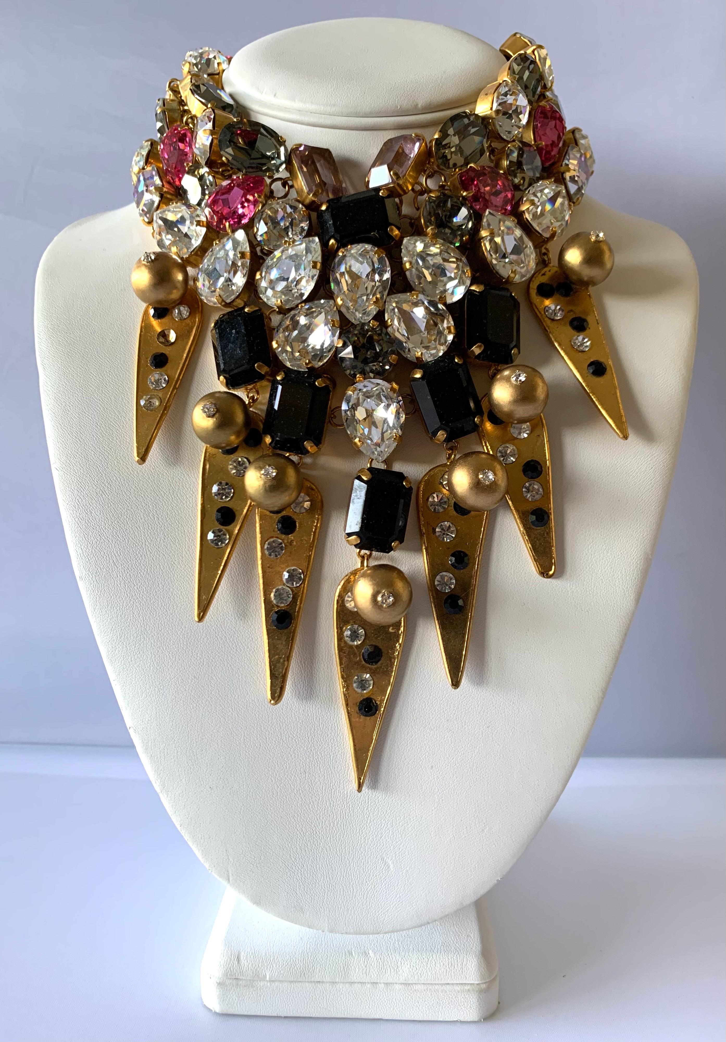 Massive Christian Lacroix haute couture fall/winter 1992/1993 runway-defile jeweled necklace featuring a contemporary design accented by large glass faceted stones, gold design elements, and large faux pearls, signed Christian Lacroix.

Note: the