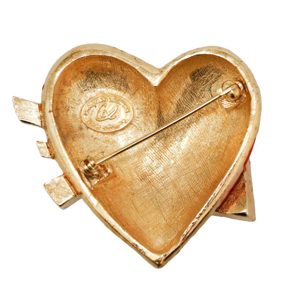 Stunning heartshaped CHRISTIAN LACROIX enamelled brooch
Condition: very good
Made in France
Material: metal, enamel
Color: red and multicolor
Dimensions: 4 x 4 cm
Hardware: gold-plated
Stamp: yes
Year: Vintage
Details : LACROIX brooch in the shape