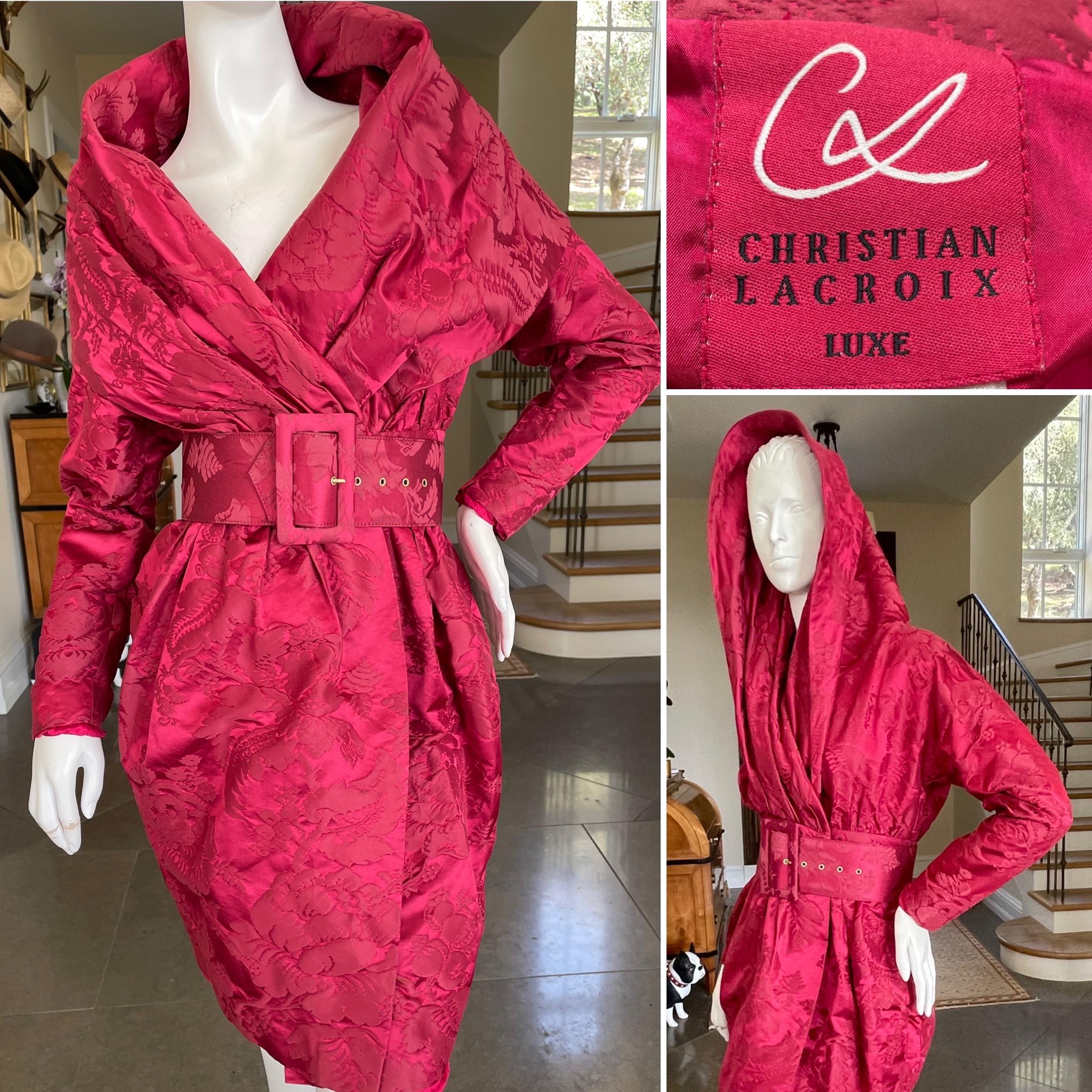 Christian Lacroix Luxe Collection 1988 Red Jacquard Belted Dress with Portrait Neckline.
Lacroix’s Luxe collection premiered in 1988, a season before his ready to wear, and was priced from $3500-$12,000 , below his Haute Couture collection but