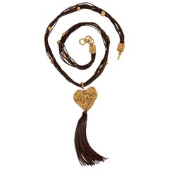 Collier Christian Lacroix en métal doré et cuir