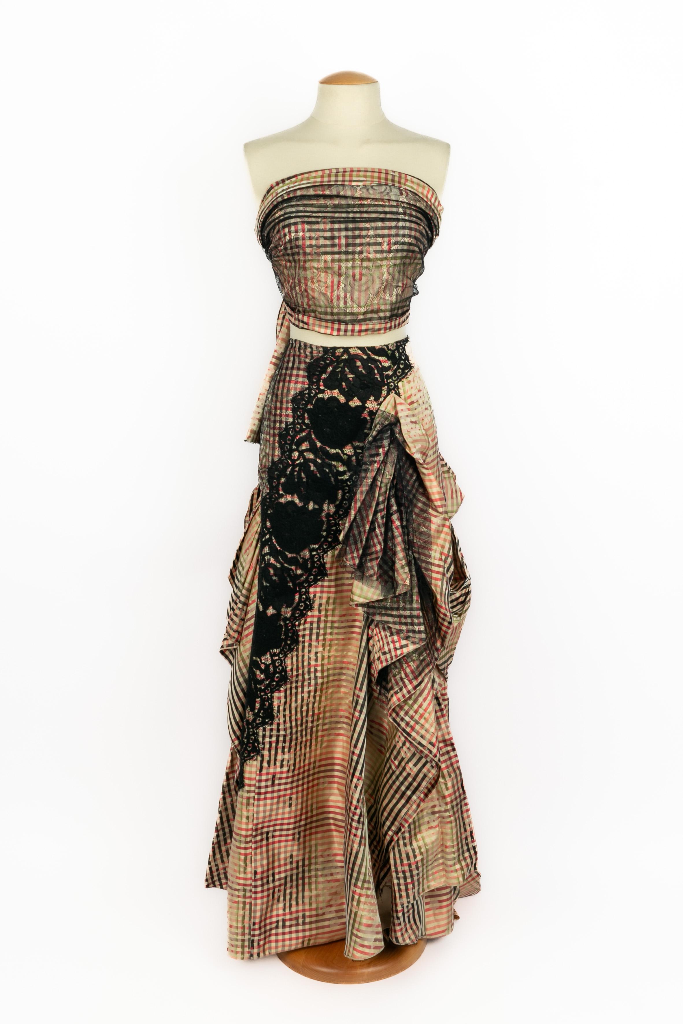 CHRISTIAN LACROIX - (Made in France) Gingham silk skirt and stole in pink, green, red, and black tones, with black lace. Size 38FR indicated.

Condition:
Very good condition

Dimensions:
Skirt: Waist: 35 cm - Length: 113 cm // Stole: 200 cm x 66