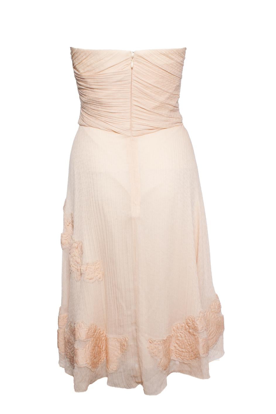 Christian Lacroix, Strapless nude colored dress with bustier. The item is in very good condition.

• CONDITION: very good condition

• SIZE: IT40 - XS

• MEASUREMENTS: length 82 cm, width 37 cm, waist 31 cm

• MATERIAL: 100% silk

• CARE: dry