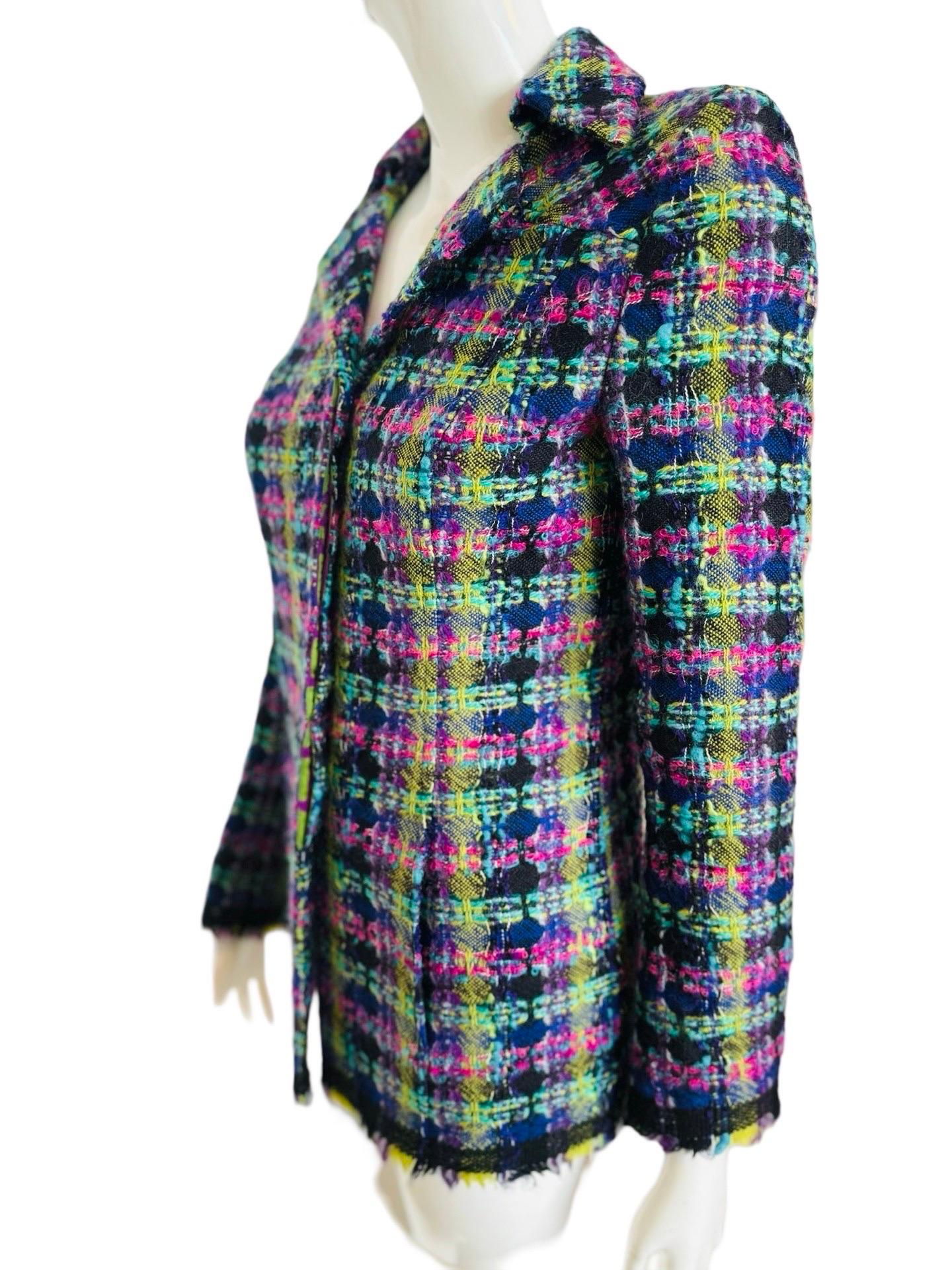 Insane colors on this tweed blazer from 90s Christian Lacroix Bazaar label. It is so unique. The buttons are hidden when closed.  Cool green and purple lining on the top portion and in the sleeves.  Hip length. Excellent condition.

Shoulders