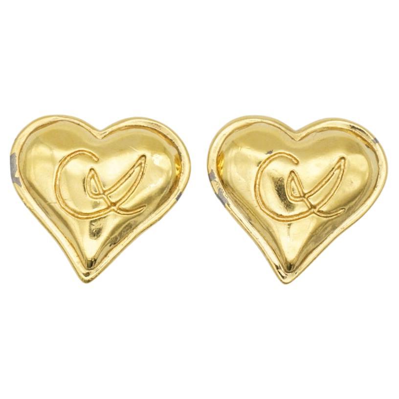 Christian Lacroix Vintage 1980s Classic Logo Monogram Heart Love Clip Earrings, Gold Tone

Good condition. 100% Genuine. Signed at the back. 

Some peels at side and back.

Size: 3.0*3.0 cm.

Weight: 13.0 g/each.

_ _ _

Great for everyday wear.
