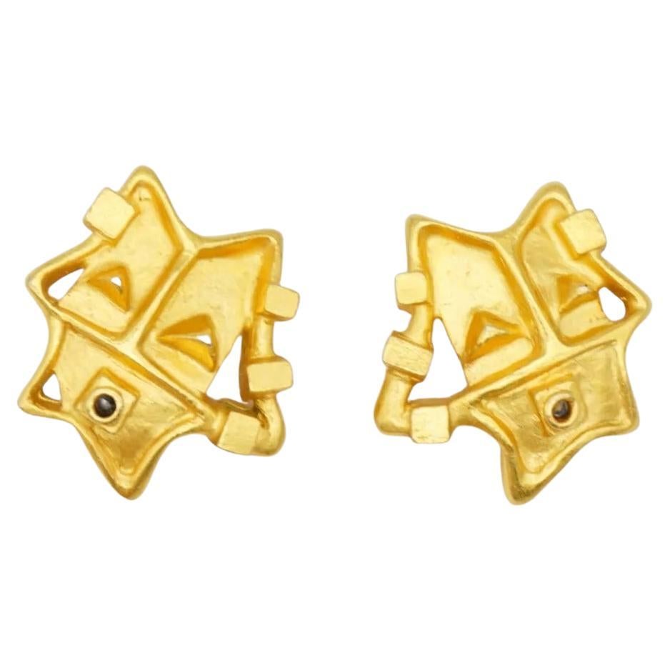 Christian Lacroix Vintage 1980s Geometric Face Smile Openwork Modernist Clip Earrings, Gold Tone

Very good condition. Some light scratches or colour loss, barely noticeable. 100% Genuine.

Signed at the back. 

Size: 2.7*2.7 cm.

Weight: 10.0
