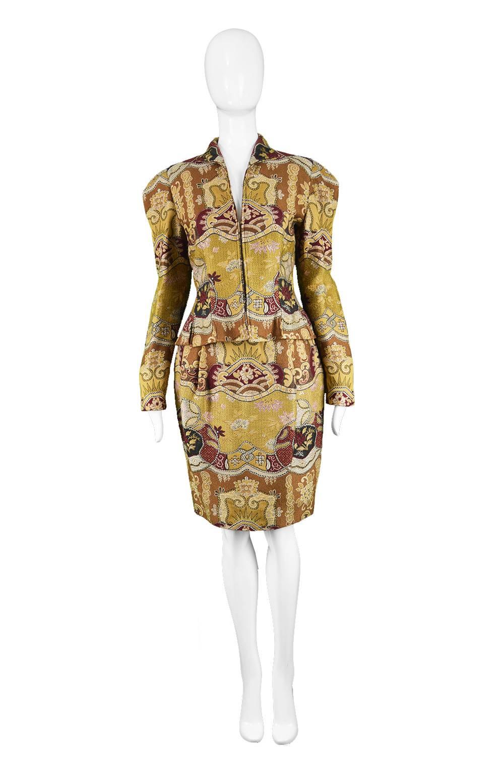 Christian Lacroix Vintage 1990s Asian Patterned Jacquard Brocade 2 Piece Suit

Estimated Size: UK 10/ US 6/ EU 38. Please check measurements. 
Jacket
Bust - 34” / 86cm
Waist - 28” / 71cm
Length (Shoulder to Hem) - 19” / 48cm
Shoulder to Shoulder -